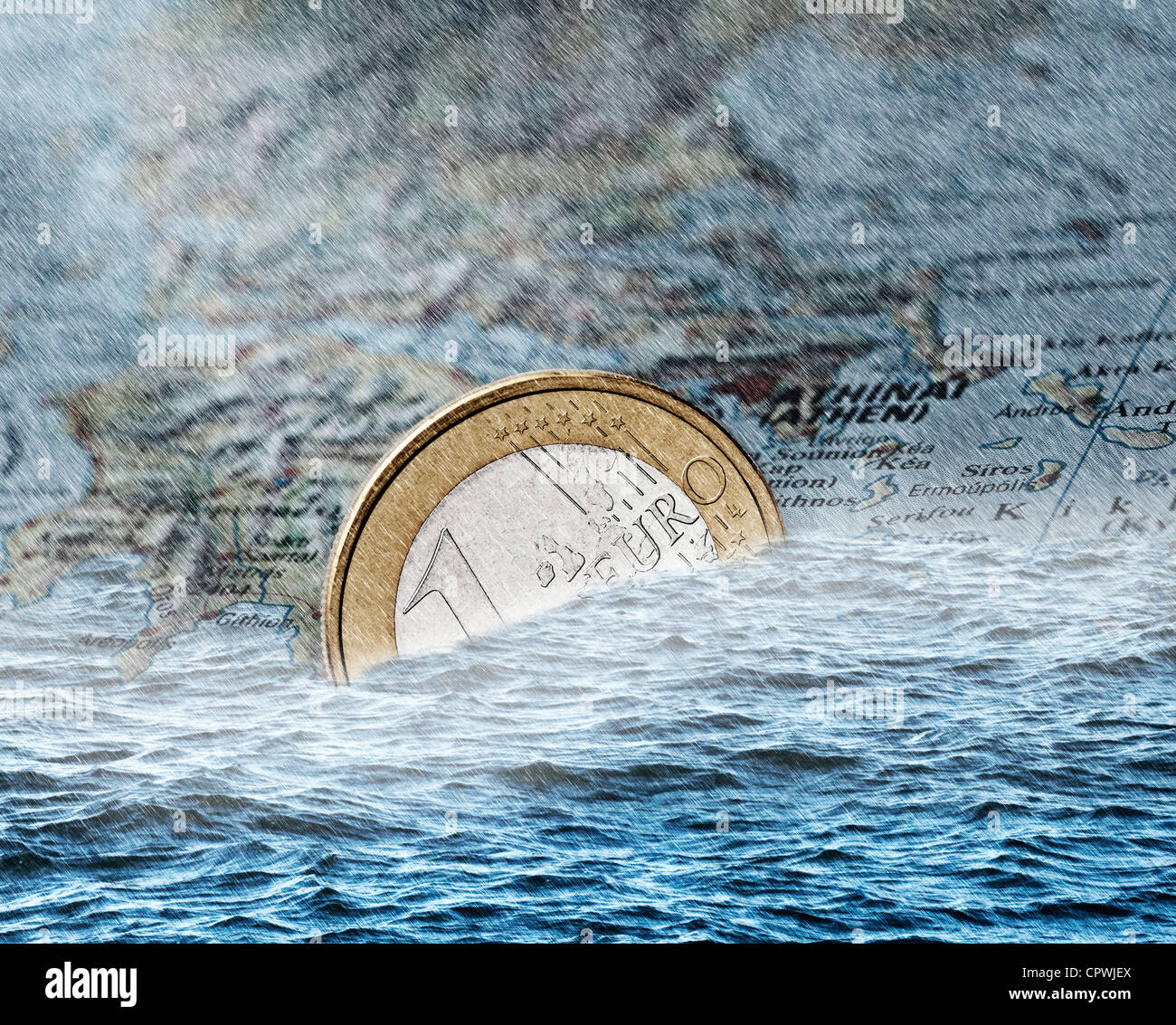 €-coin sinks into the sea off the coast of Greece. Stock Photo