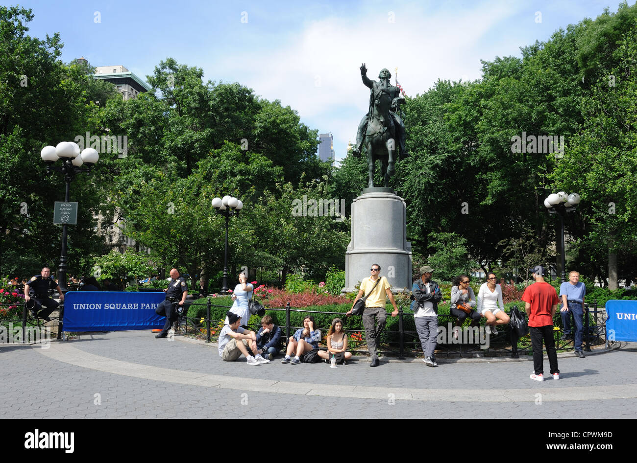 An equestrian statue of George Washington, dedicated in 1865, is the centerpiece of the southern flank of Union Square Park. Stock Photo
