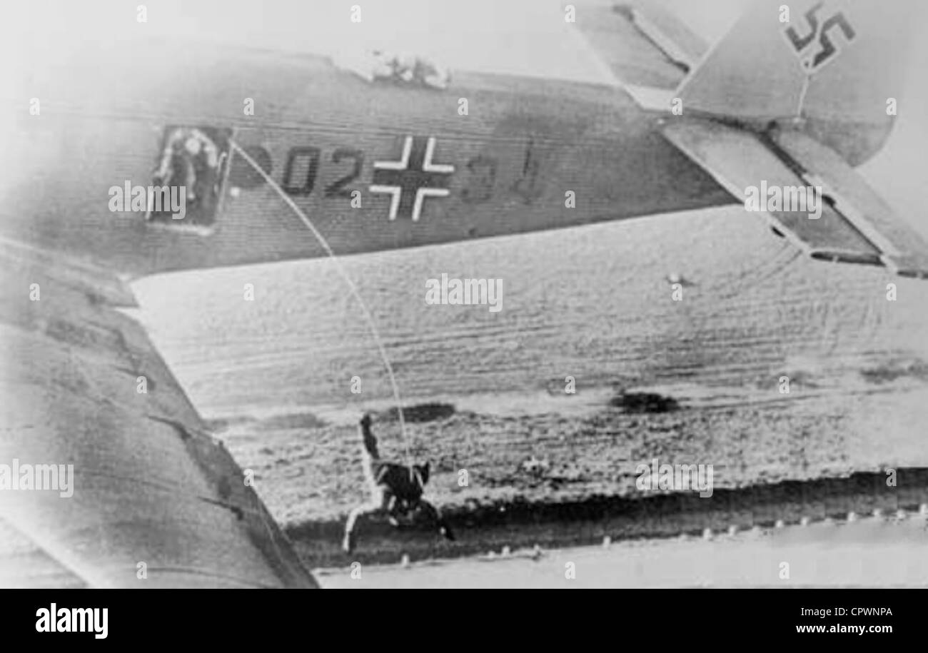 German paratroopers jumping from a Junkers Ju 52 3/m transport during exercises in 1938. Stock Photo