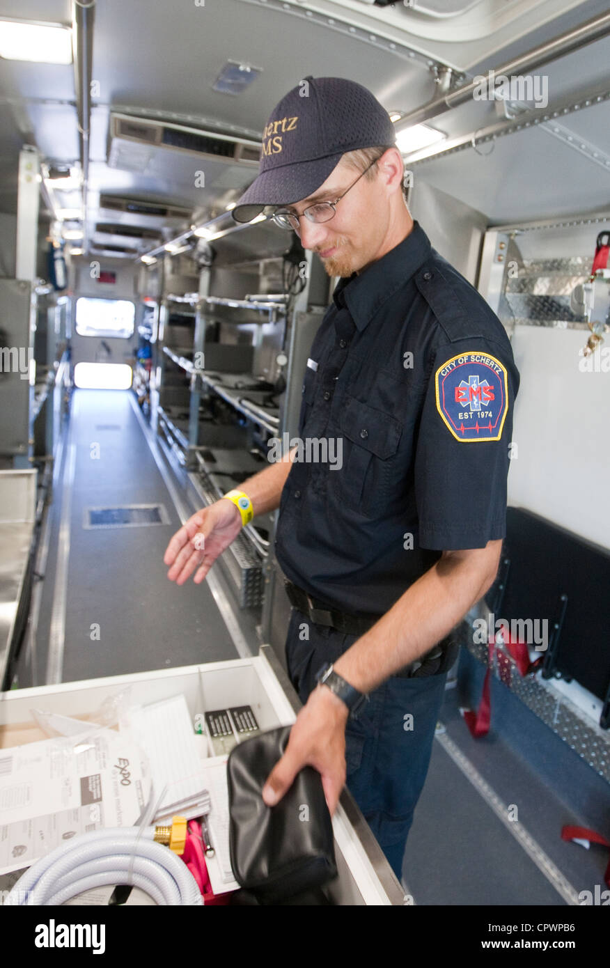 white male EMS from City of Schertz in Texas, checks for