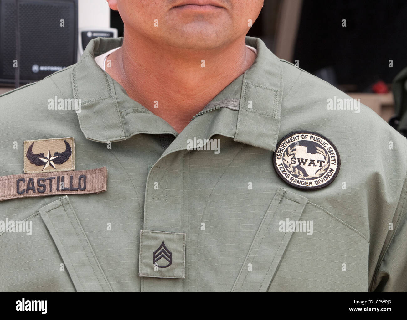 Close-up of uniform of member of Texas SWAT team. Texas department