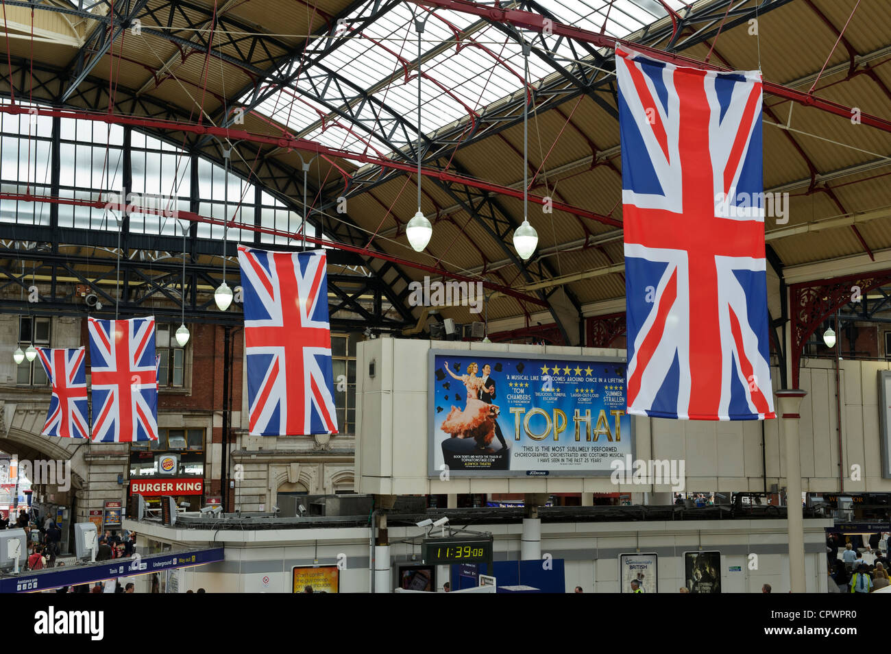 Union Jack flags, Victoria Train Station, London, England Stock Photo