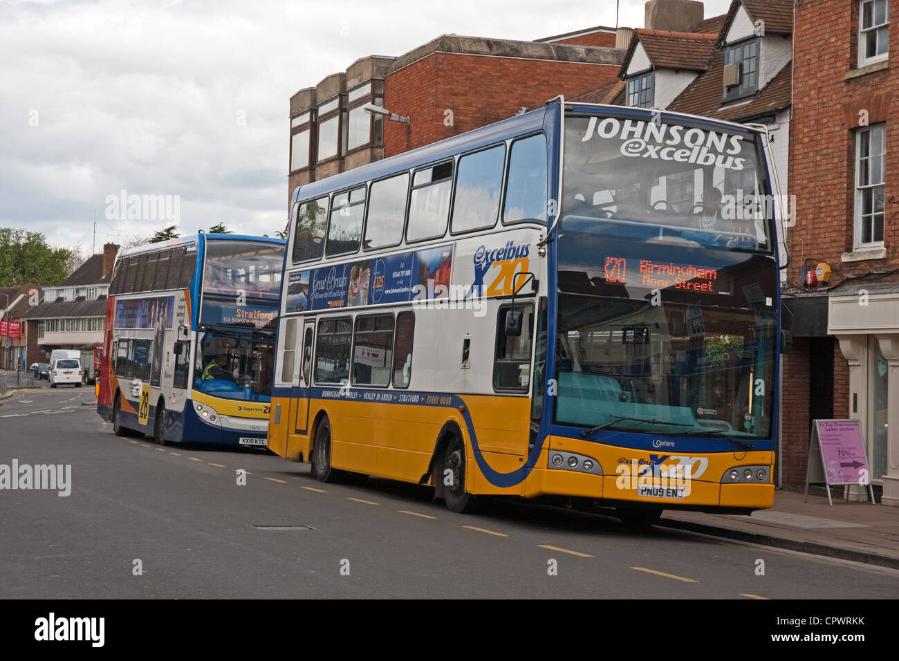 Double deck buses awaiting passengers Stock Photo