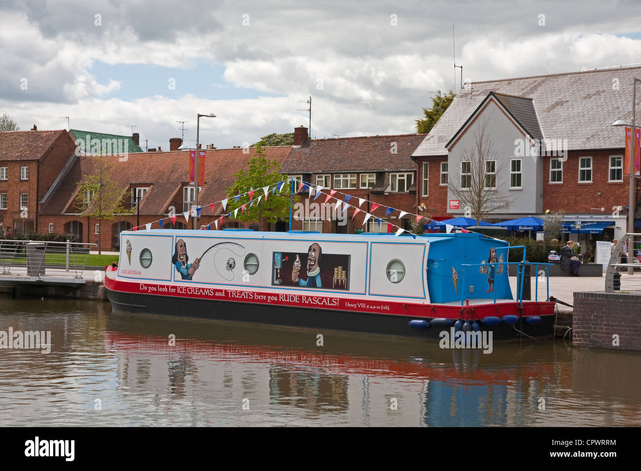 Converted canal narrow boat selling locally made ice cream in canal