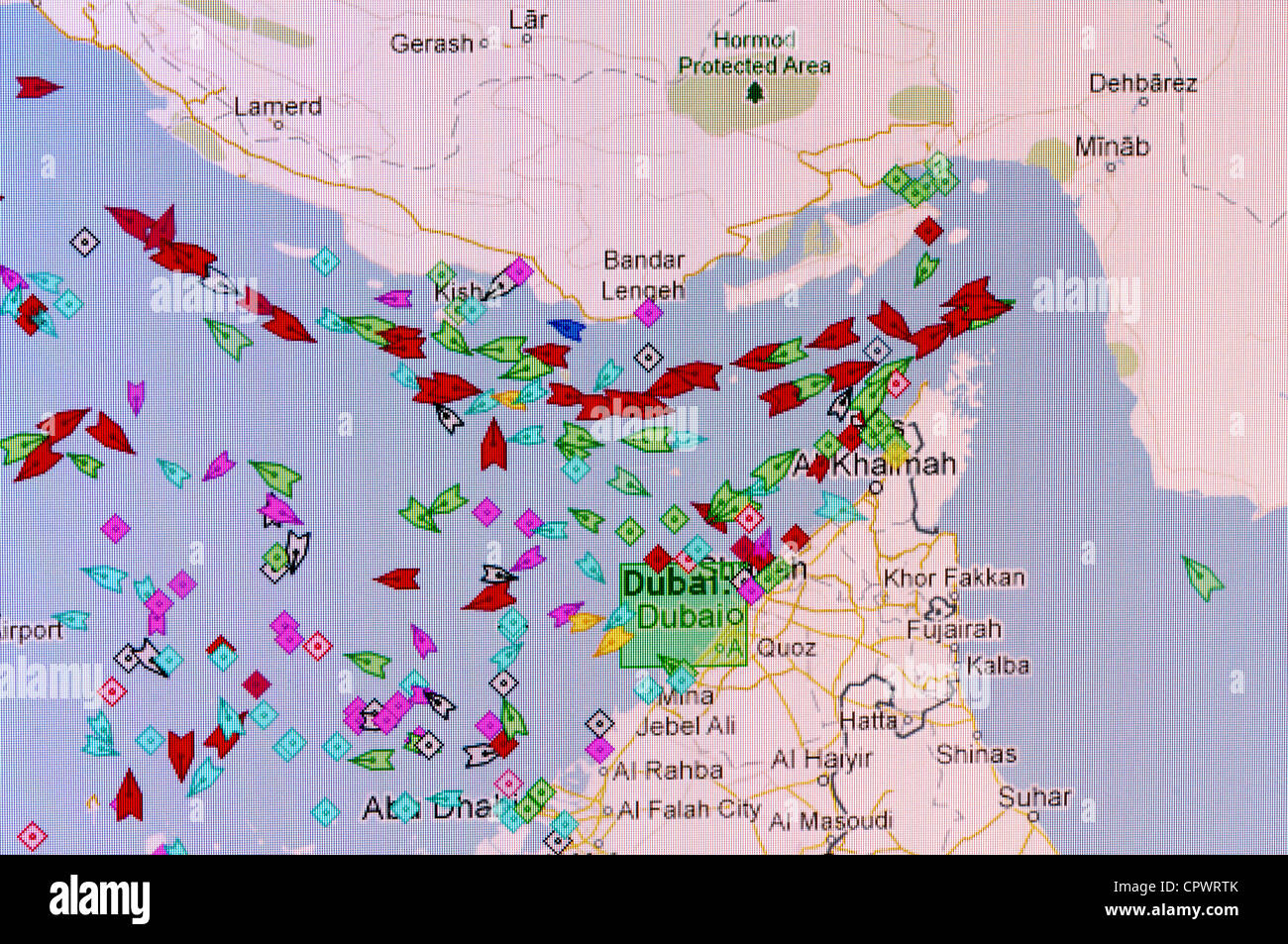 Screen shot showing real time shipping traffic through the Straits of Hormuz with a large number of oil tankers (in red) Stock Photo