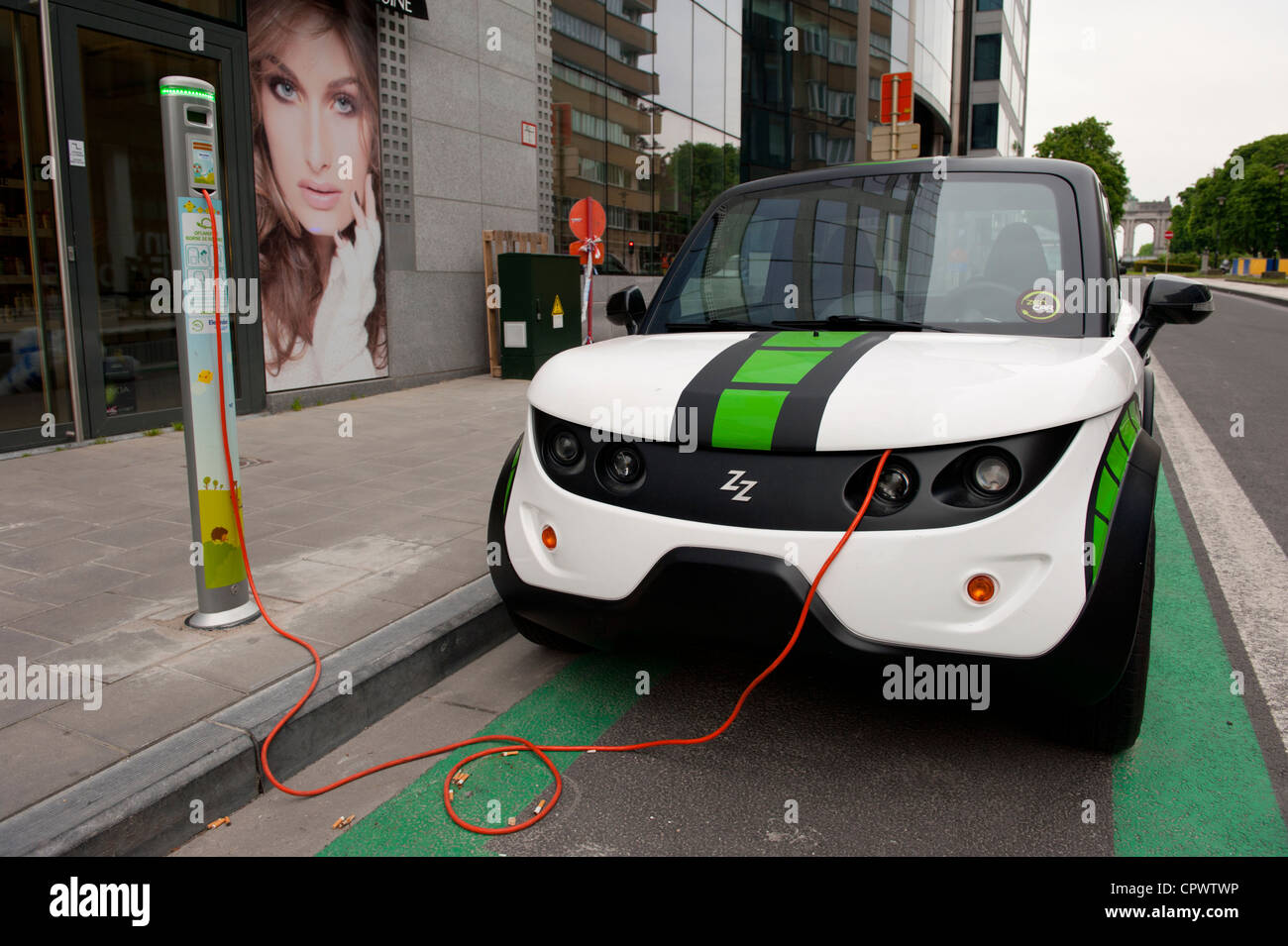 Electric car being re-charged, Brussels, Belgium Stock Photo