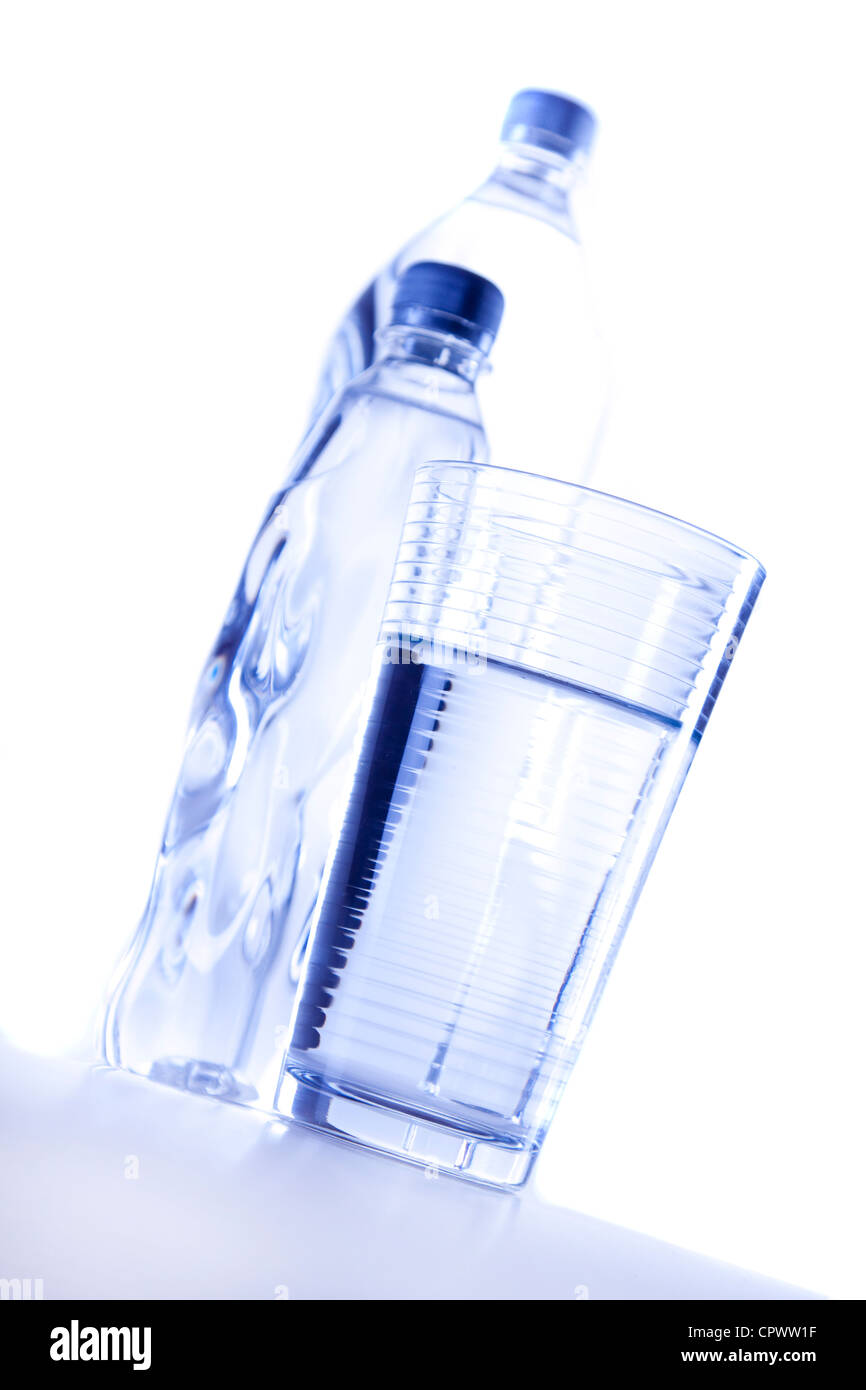 Drinking water in bootles and cup Stock Photo - Alamy