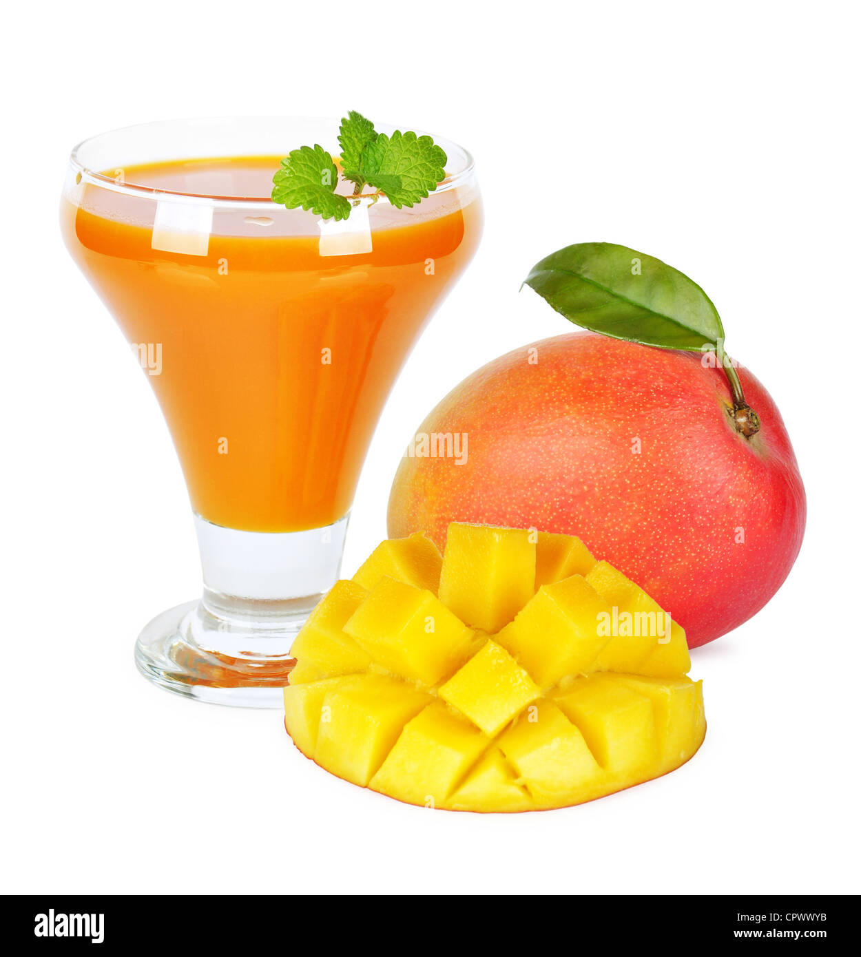 mango juice in a glass over white background Stock Photo - Alamy