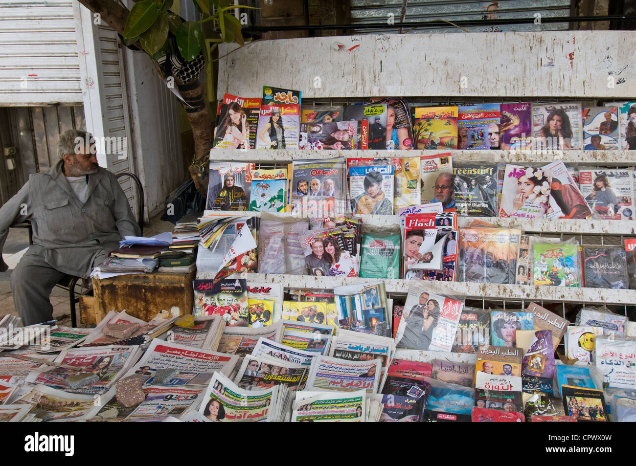 Newsstand in Tahrir square Cairo Egypt - Since the revolution many new publications have appeared in Egypt Stock Photo