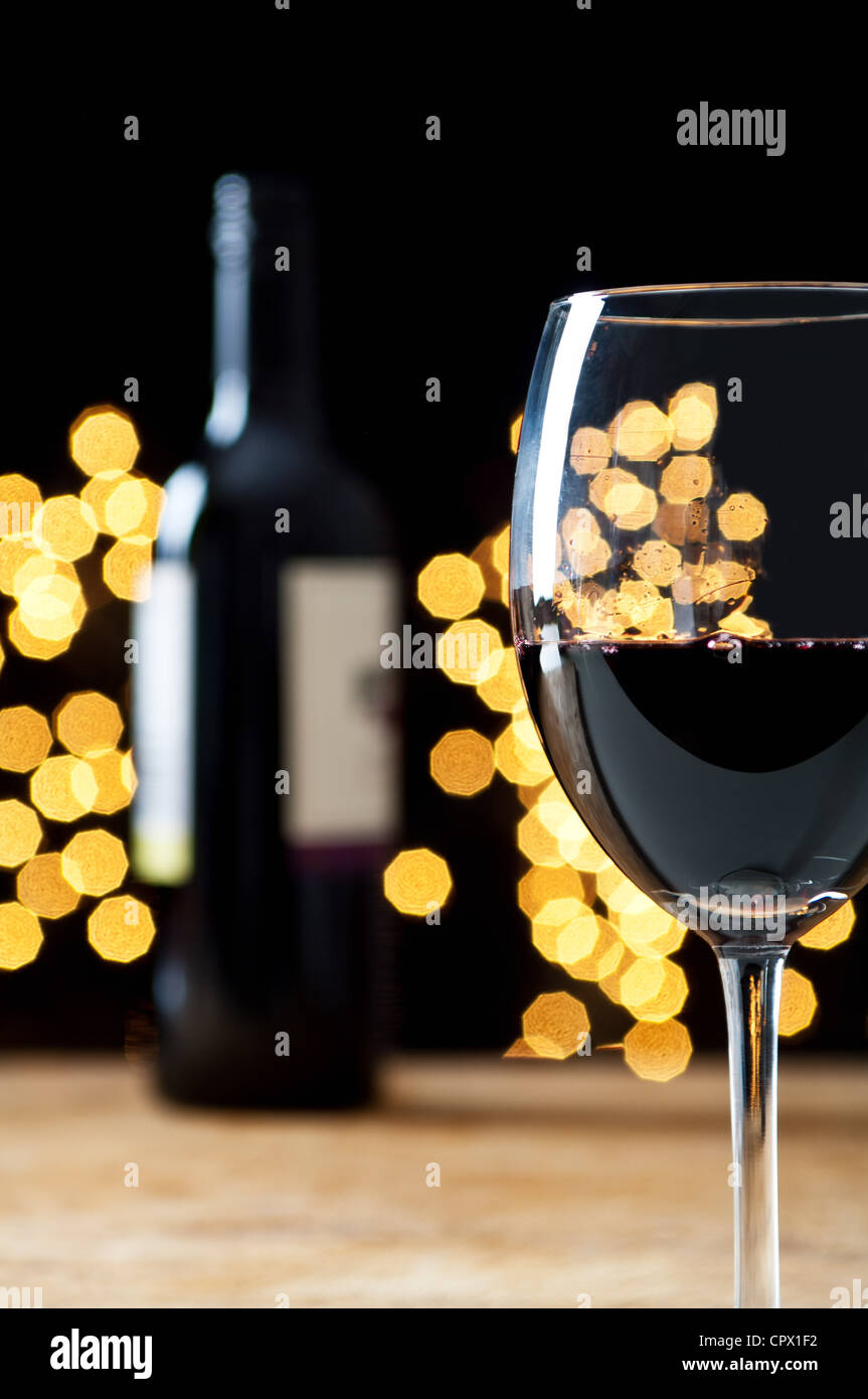 Glass and bottle of red wine Stock Photo
