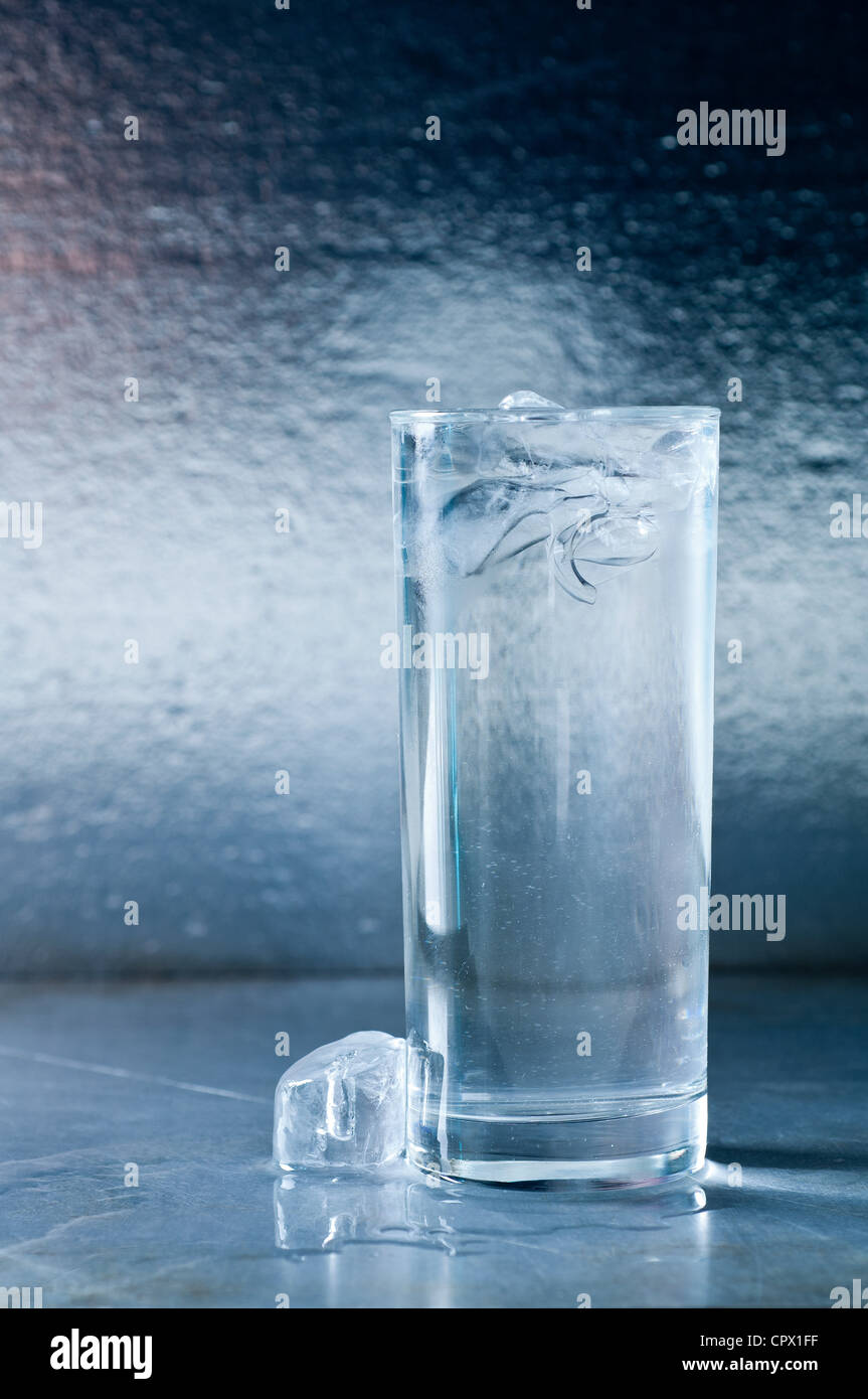 Glass of water with ice cubes Stock Photo - Alamy