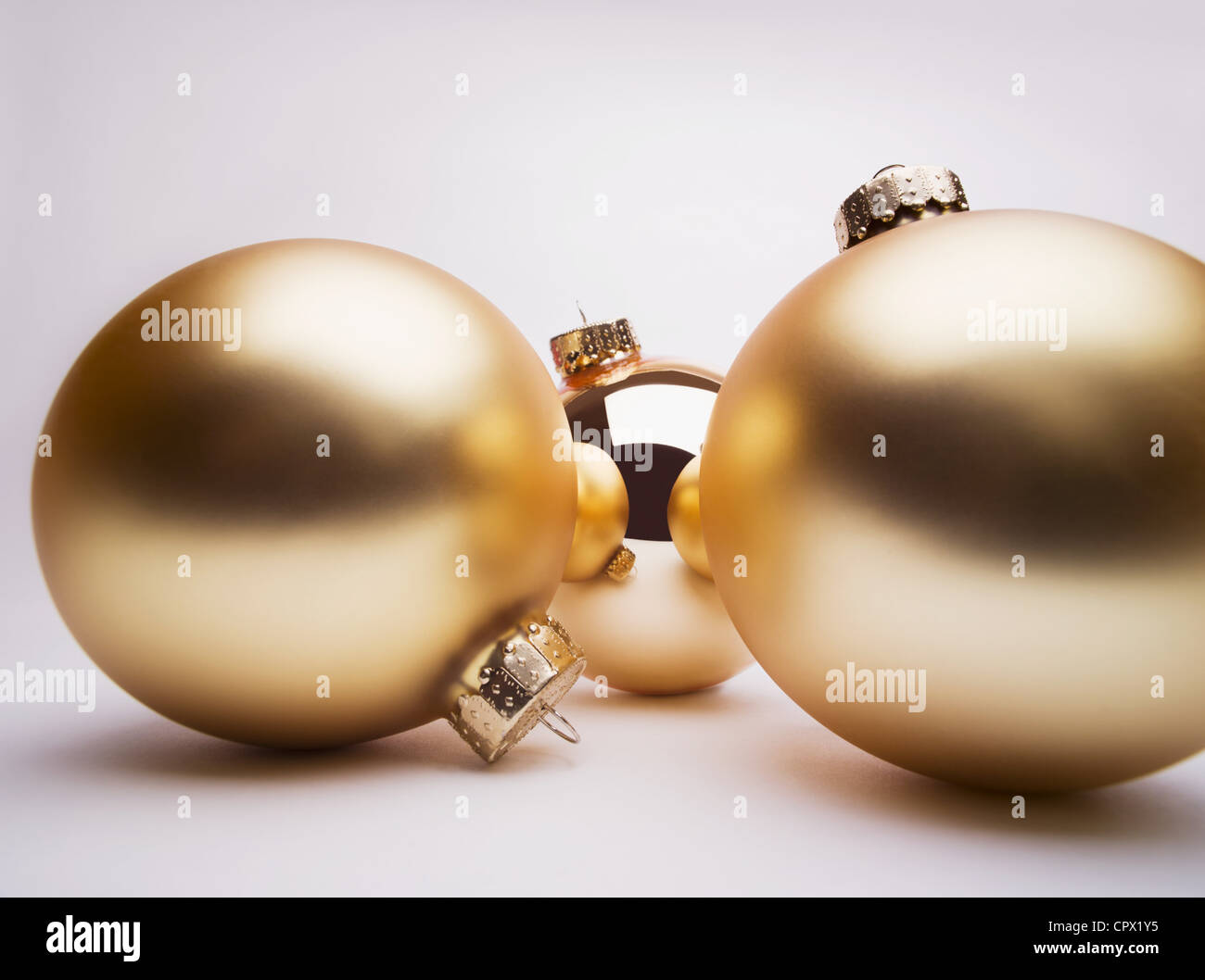 Gold Christmas decorations, studio shot Stock Photo  Alamy