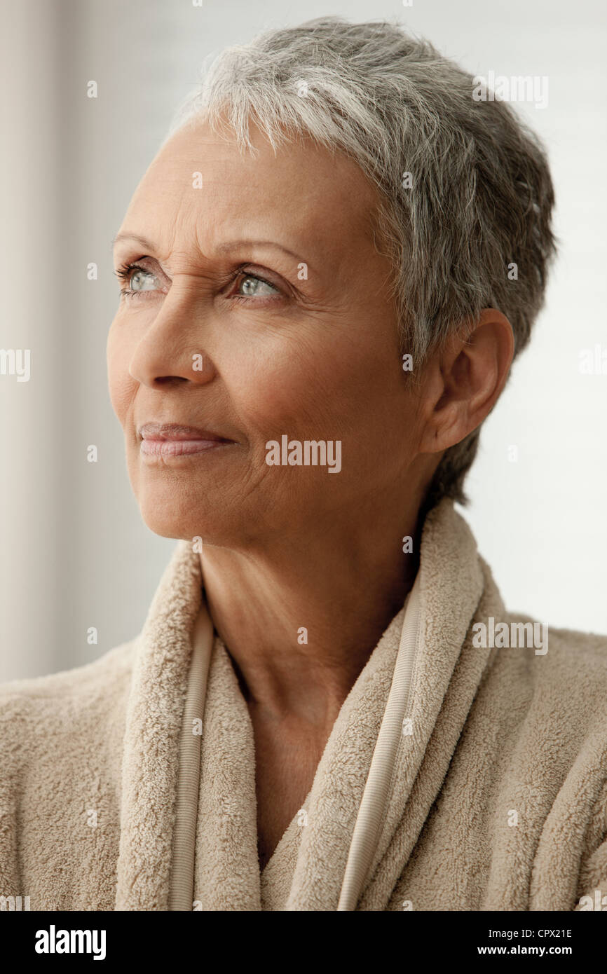 Senior woman in bathrobe Stock Photo Alamy