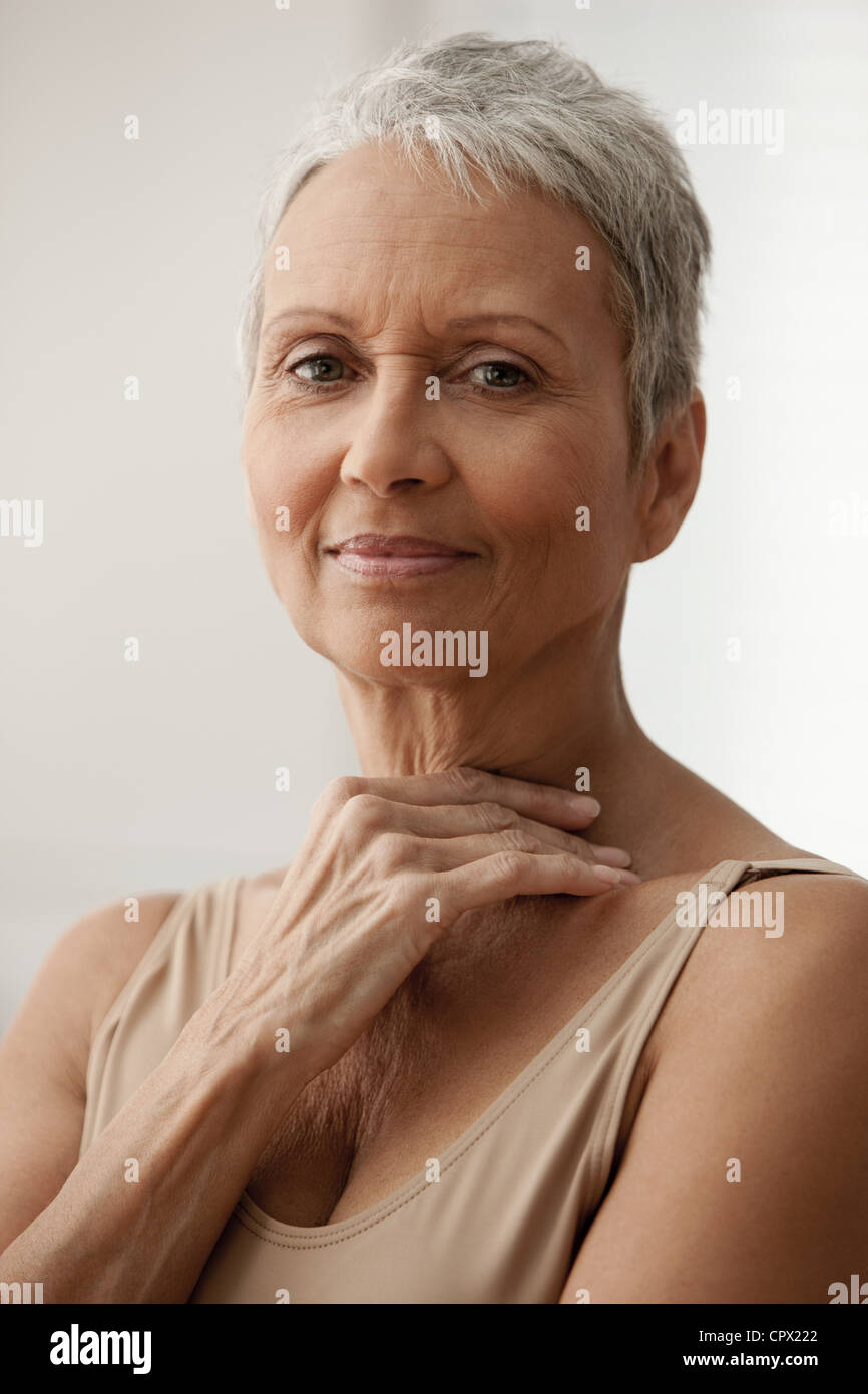 Senior woman smiling, portrait Stock Photo