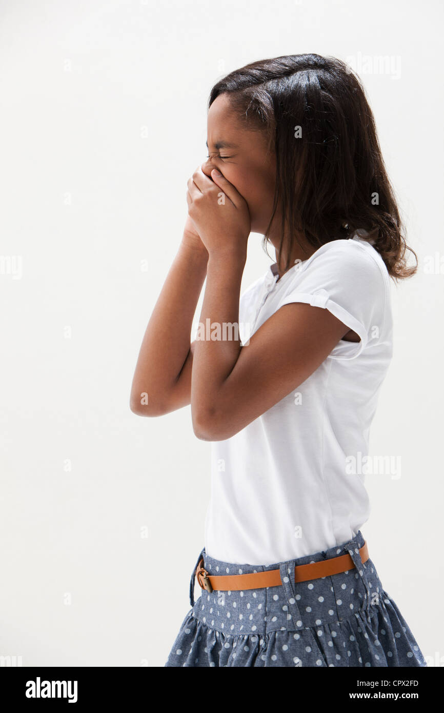 African American girl laughing, studio shot Stock Photo - Alamy