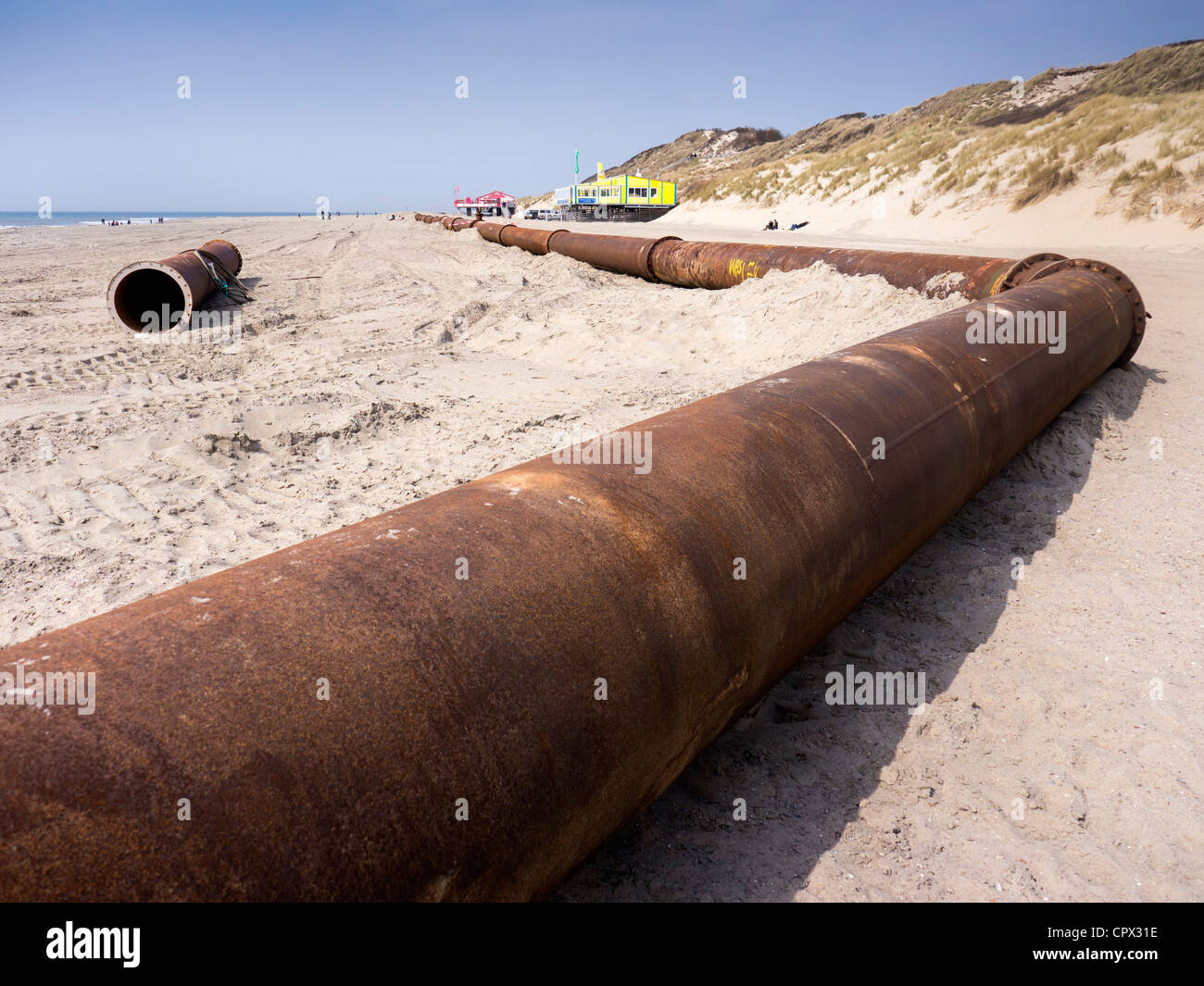 Sand replenishment on a Dutch North Sea beach to prevent coastal erosion Stock Photo