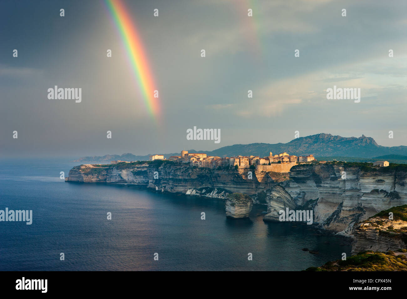 a rainbow over Bonifacio, Corsica, France Stock Photo