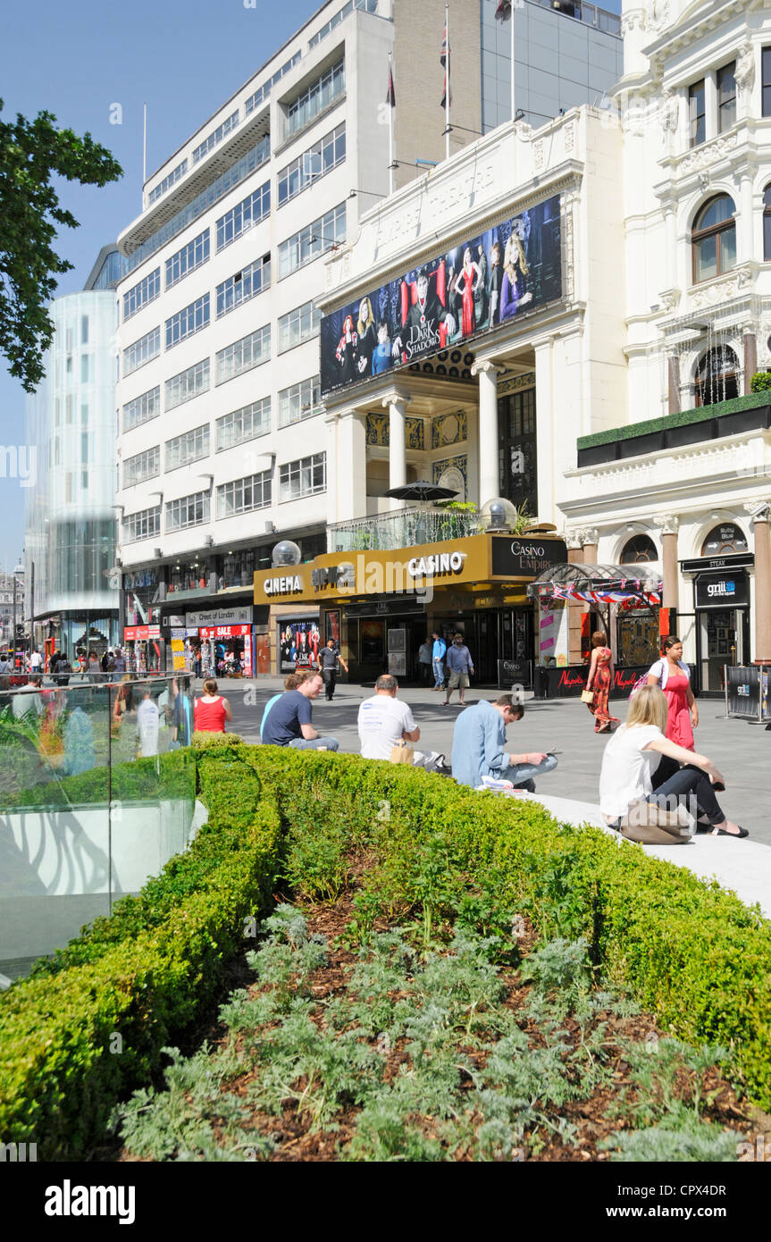 Leicester Square refurbished street amenities with Empire cinema and casino beyond Stock Photo