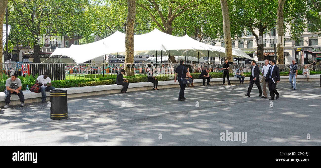 Leicester Square refurbished street amenities with Empire cinema and casino beyond Stock Photo