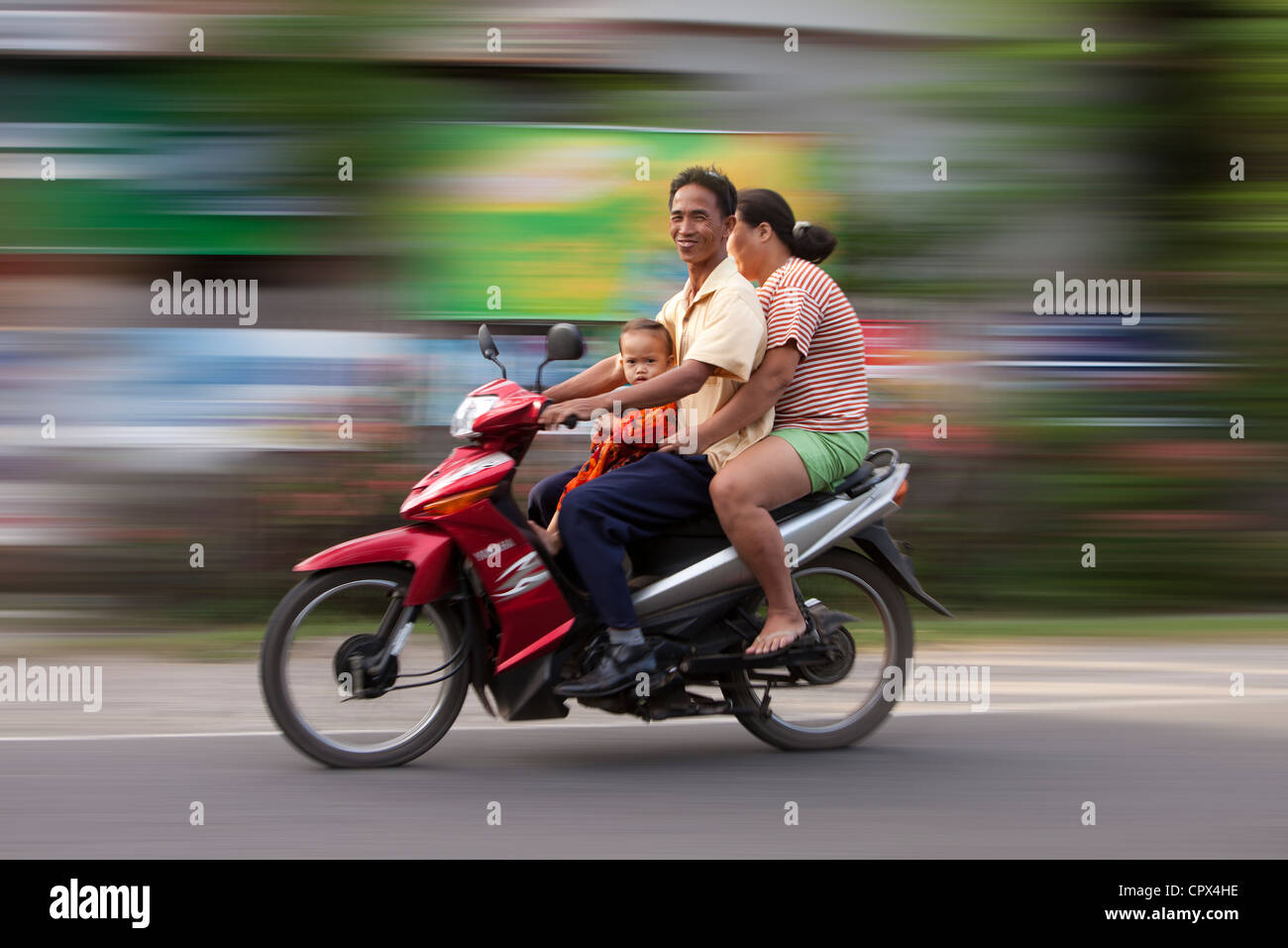 a family on a motorcycle, Negros, The Visayas, Philippines Stock Photo