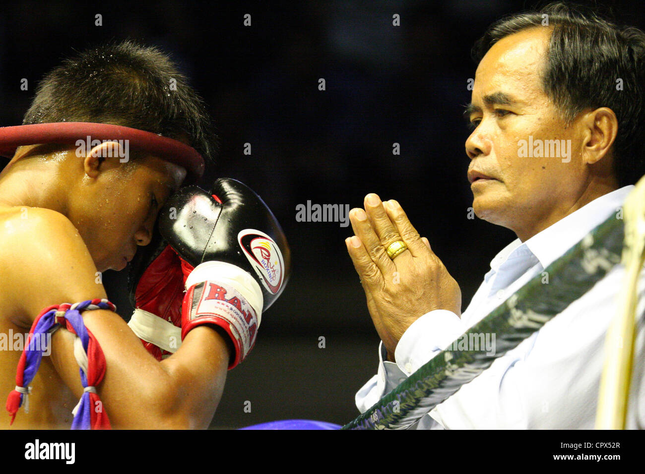 A boxer in preparation for a fight at the Rajadamern Muay Thai Stadium in Bangkok, Thailand. Stock Photo