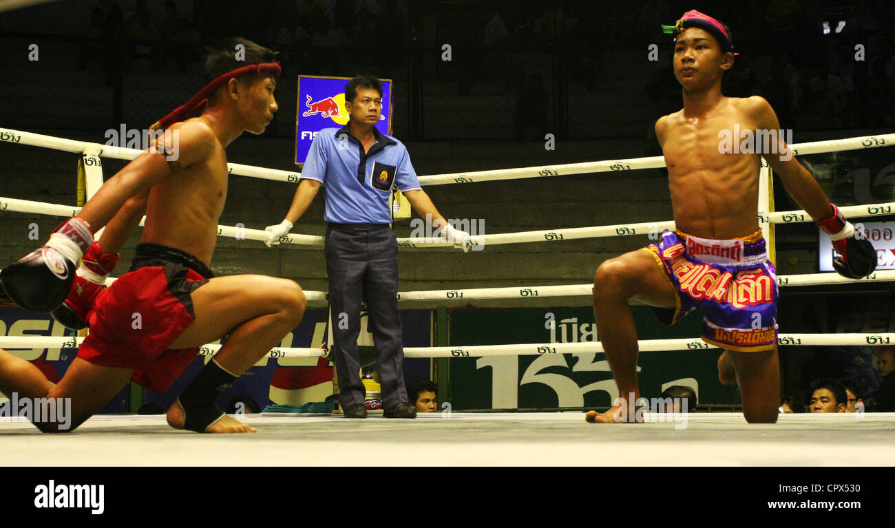 Muay Thai boxers in preparation for a bout in the Rajadamern Stadium in Bangkok, Thailand. Stock Photo