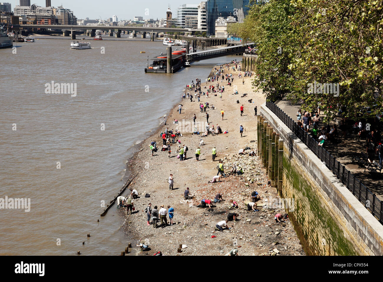 An organised archaeological event on the foreshore of the River Thames at the Tower of London. Stock Photo