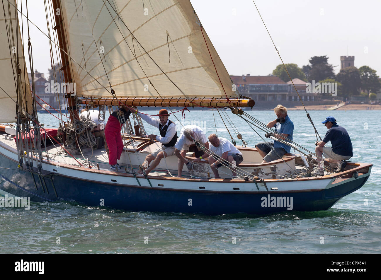 Old Gaffer tanned sail sailing in Yarmouth Festival Jubilee nostalgic Celebrations Stock Photo