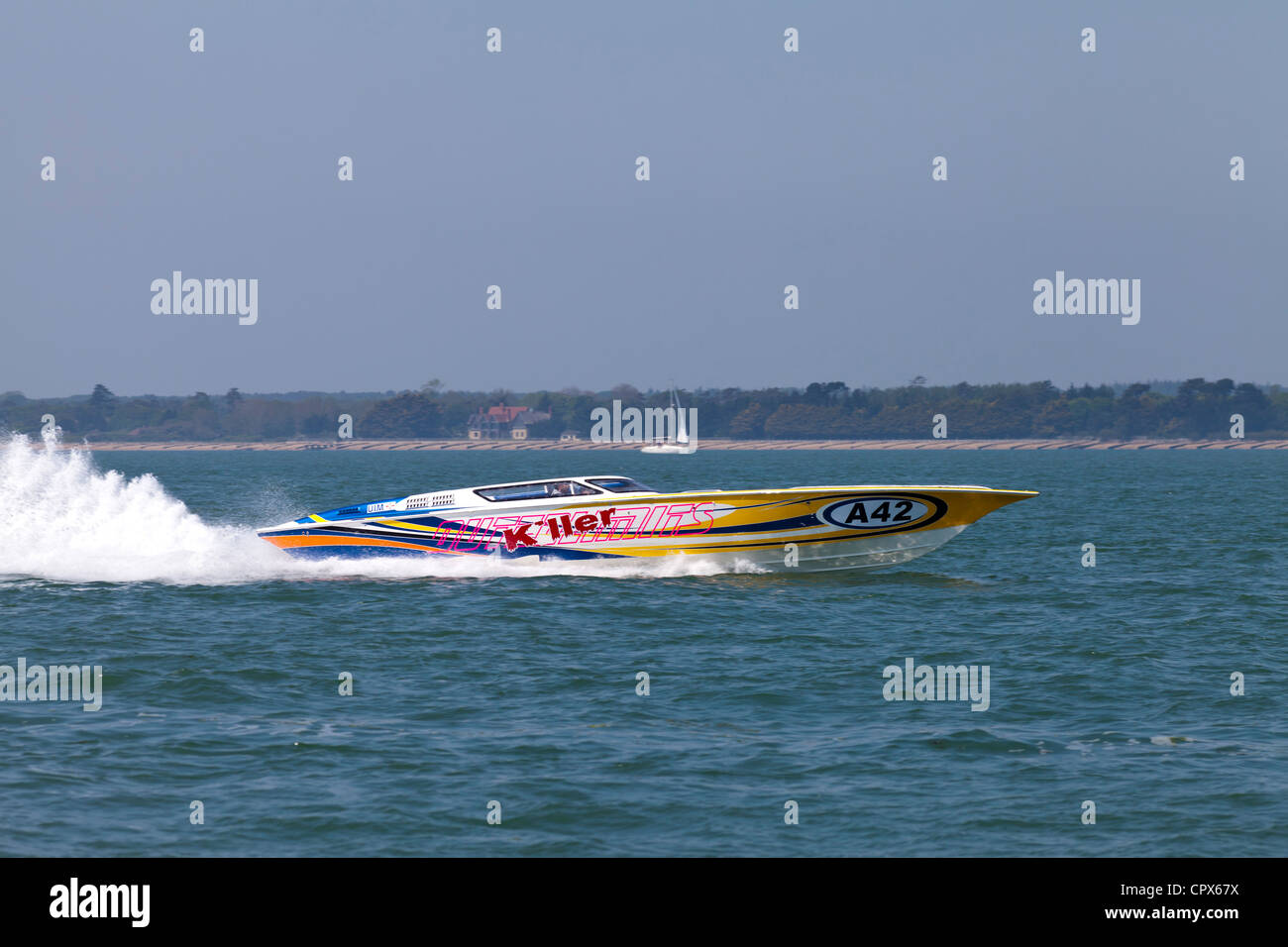 Powerful racing speed boat charging down the Solent Stock Photo