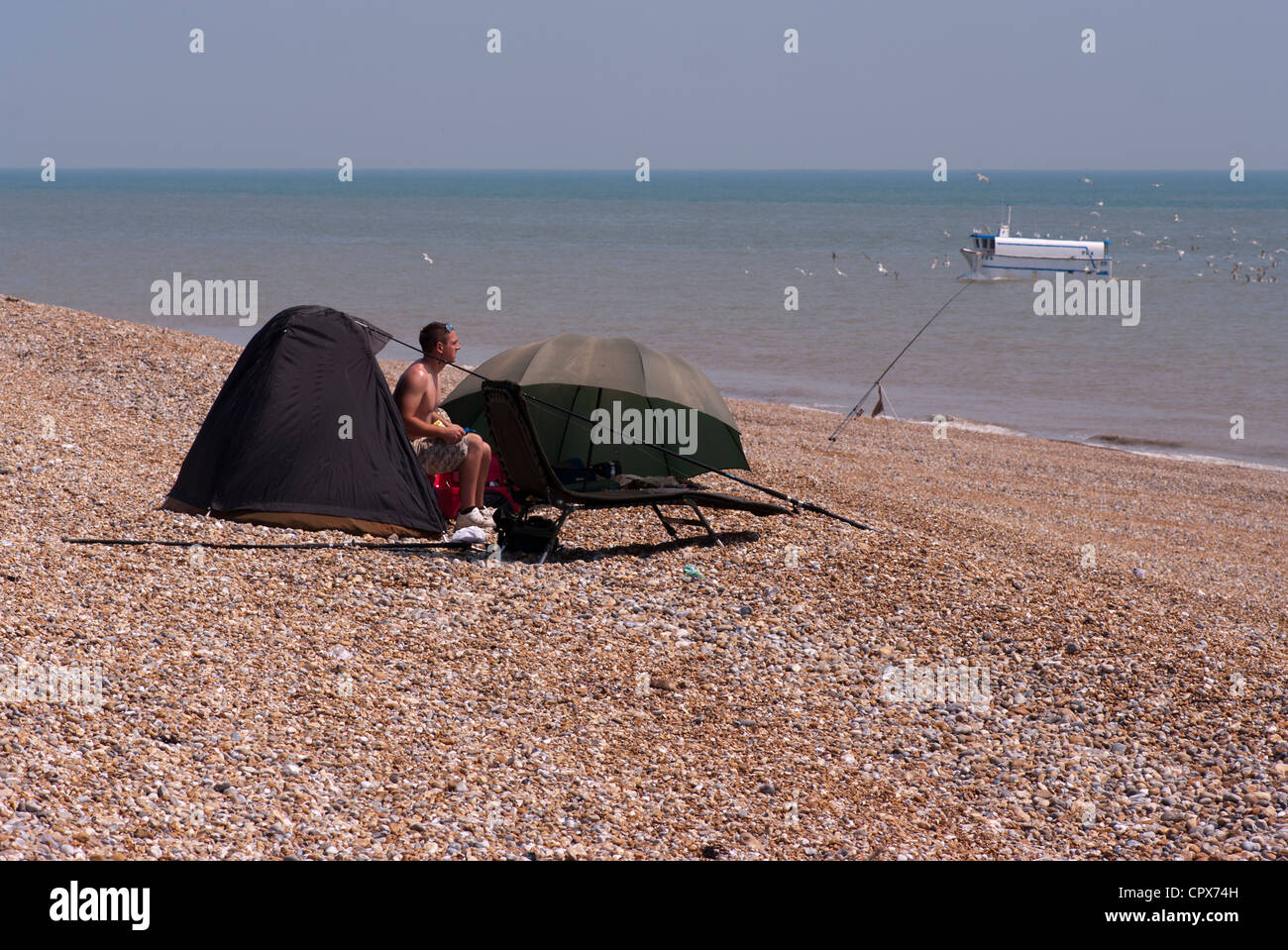 Sea Angler Person Fishing Dungeness Beach Kent UK Stock Photo - Alamy