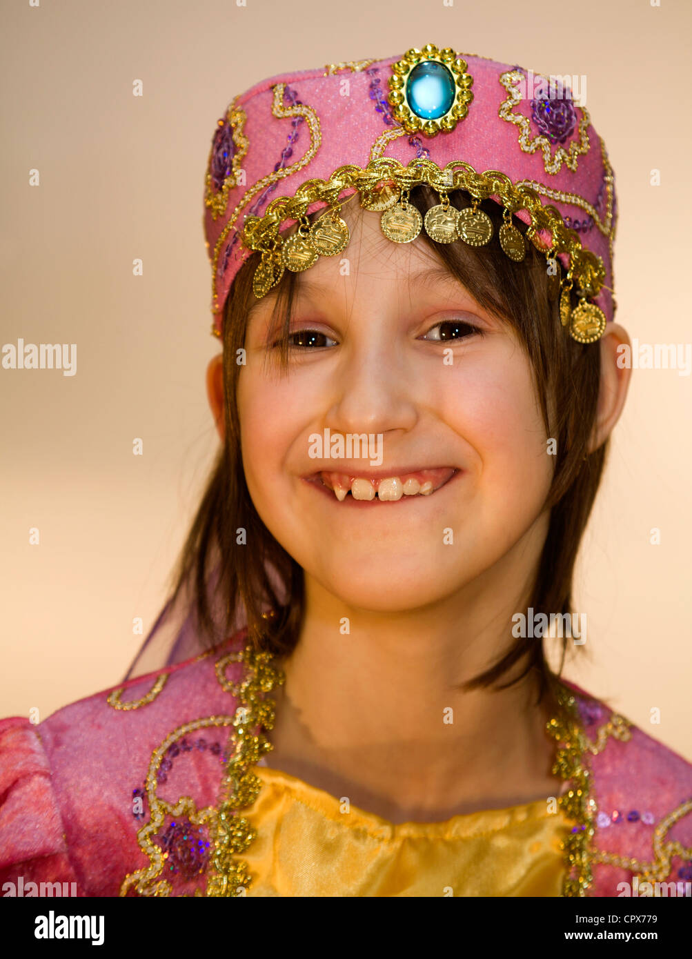 smile of little girl in carnival clothes - portrait Stock Photo - Alamy