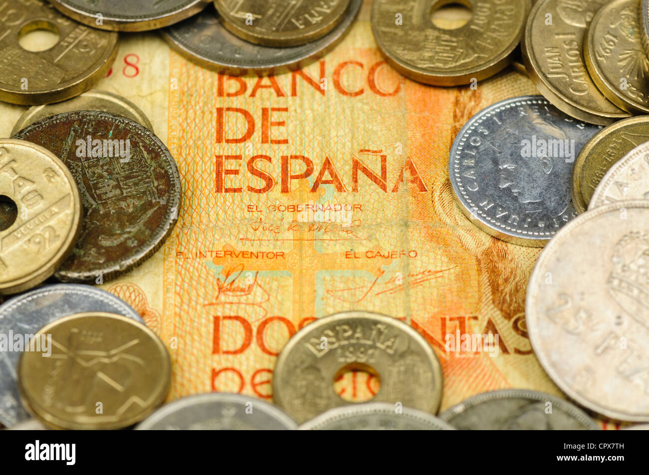 Spanish pesetas bank note and coins Stock Photo
