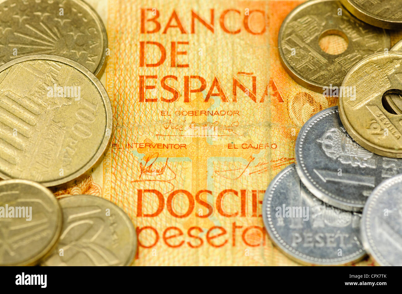 Spanish Peseta bank note and coins Stock Photo