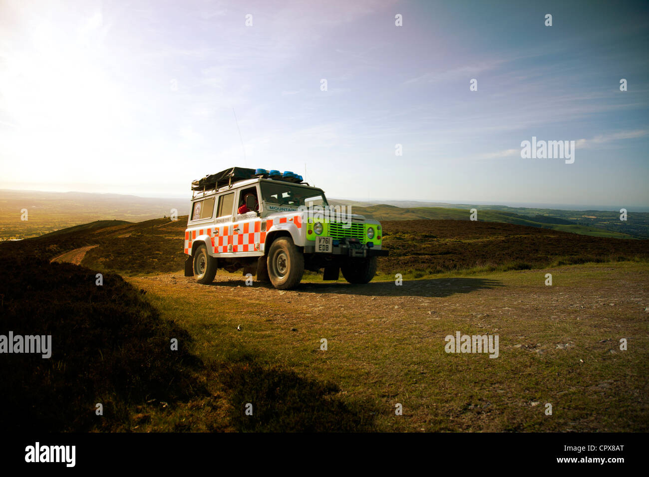 North East Wales Search and Rescue vehicle travelling along the Offas Dyke Path to the top of Moel Famau for event support, Wales, Uk Stock Photo