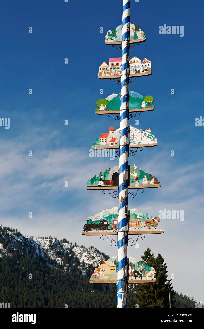 A decorative maypole stands tall in the charming Bavarian village of Leavenworth, Washington. Stock Photo