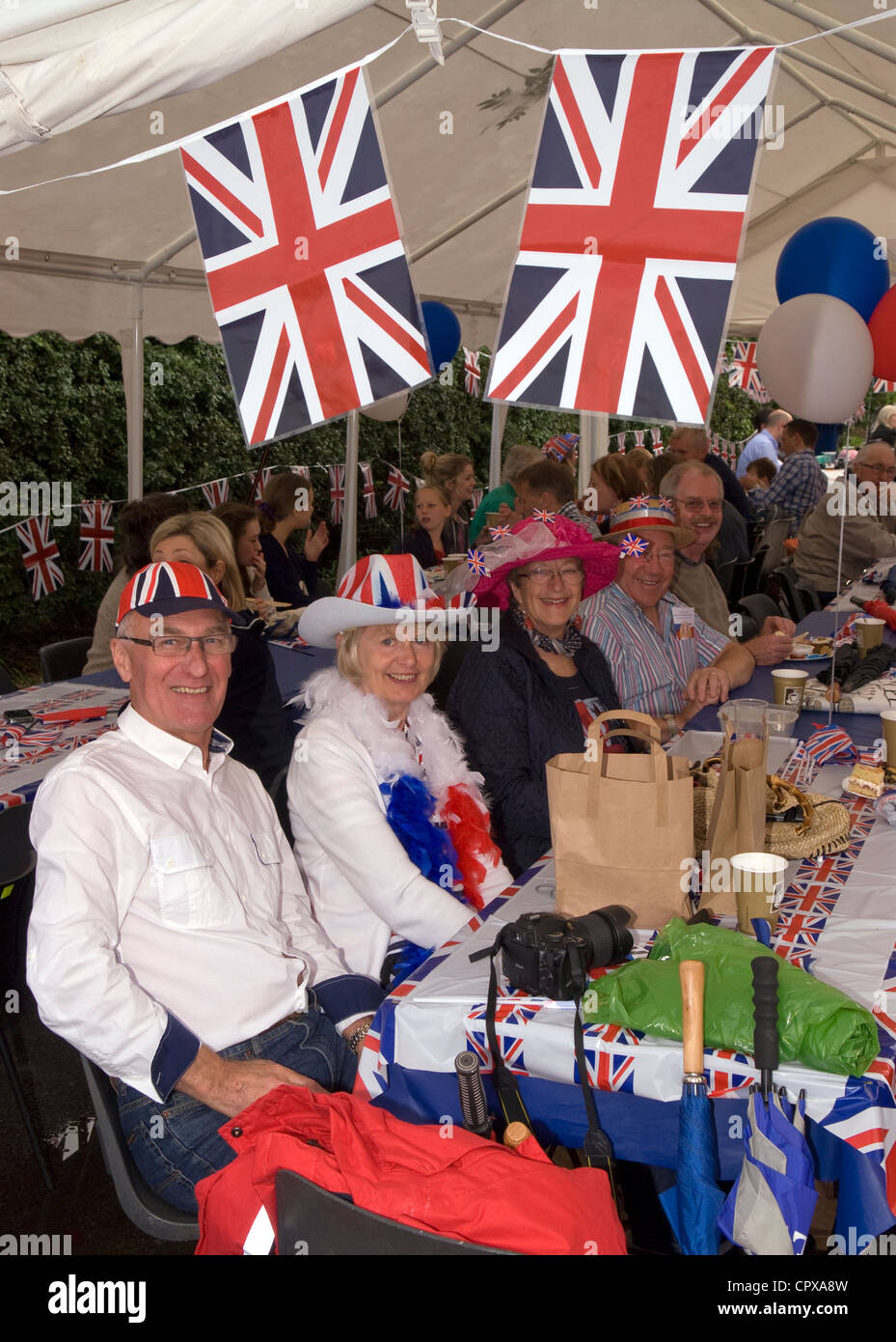 Street party in progress at the celebrations for the Queen's Diamond Jubilee, Rowledge Village, Surrey/Hampshire border, UK. Stock Photo