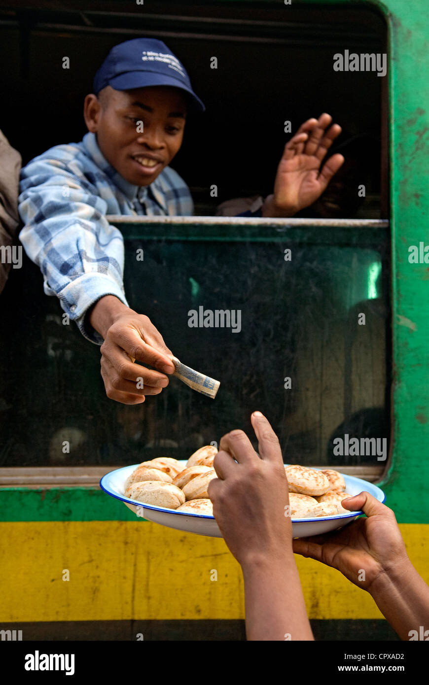 Madagascar, Highlands, former Province of Fianarantsoa, train FCE at a stop in a village between Fianarantsoa and Manakara Stock Photo