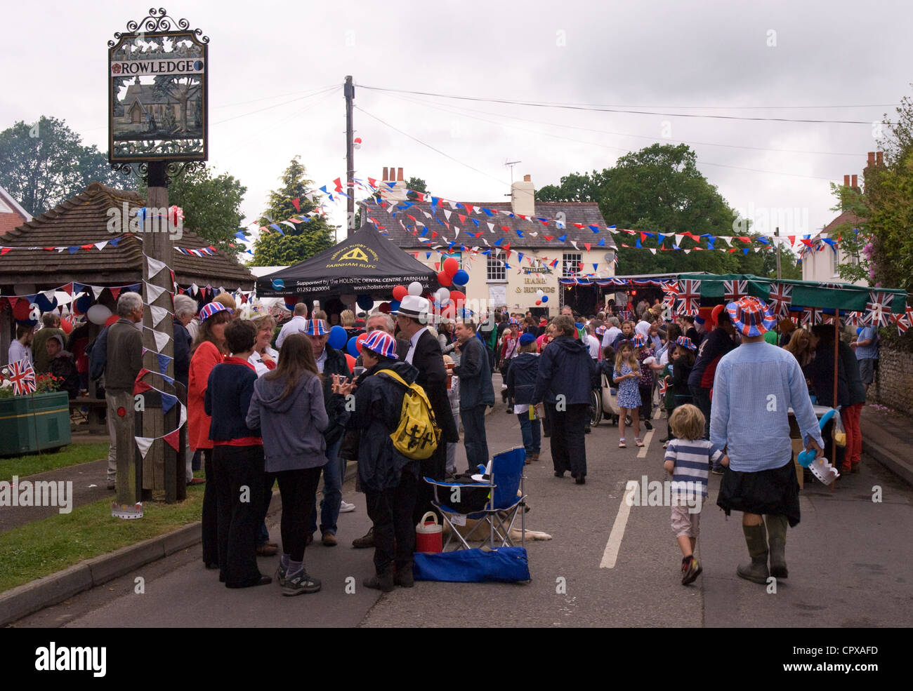 Street party in progress at the celebrations for the Queen's Diamond Jubilee, Rowledge Village, ENGLAND. Stock Photo