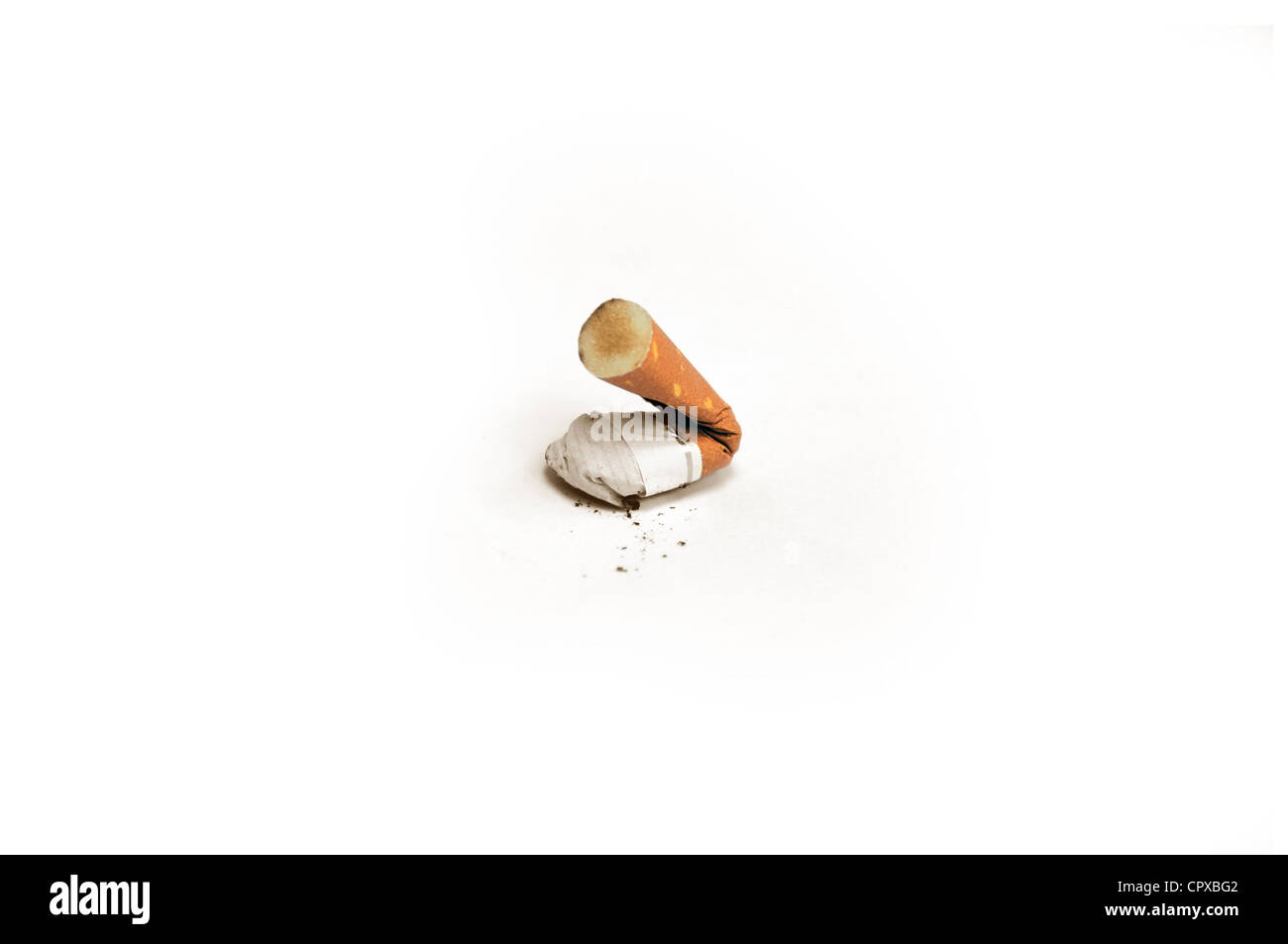 Picture shows a smoked cigarette that has been crushed and put out. Stock Photo