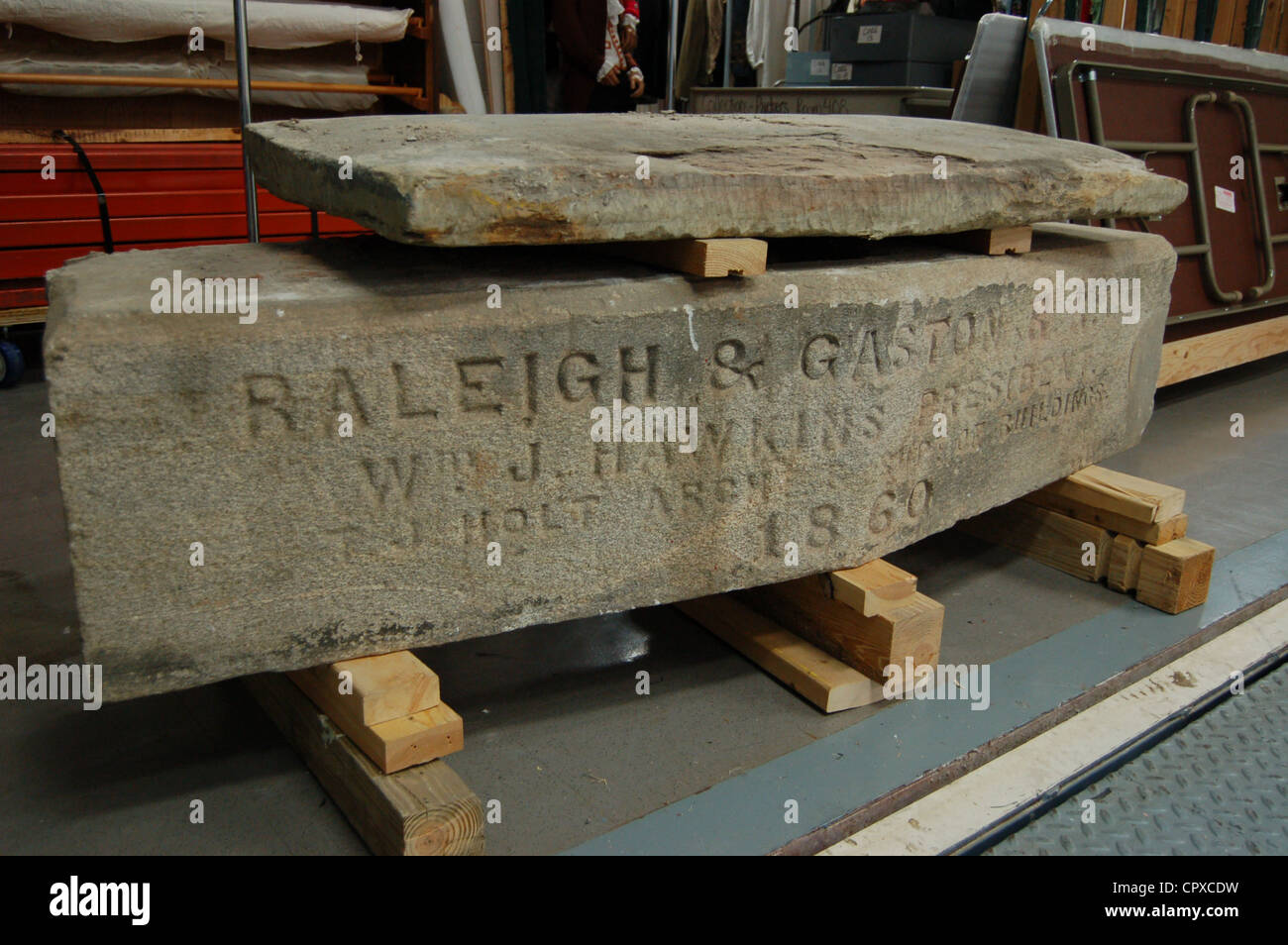 The cornerstone of the long-gone Raleigh and Gaston Railroad building Stock Photo