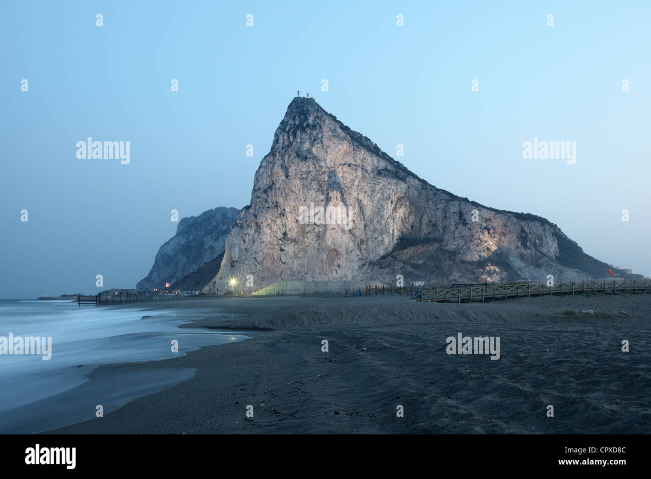 The Rock of Gibraltar illuminated at dusk Stock Photo