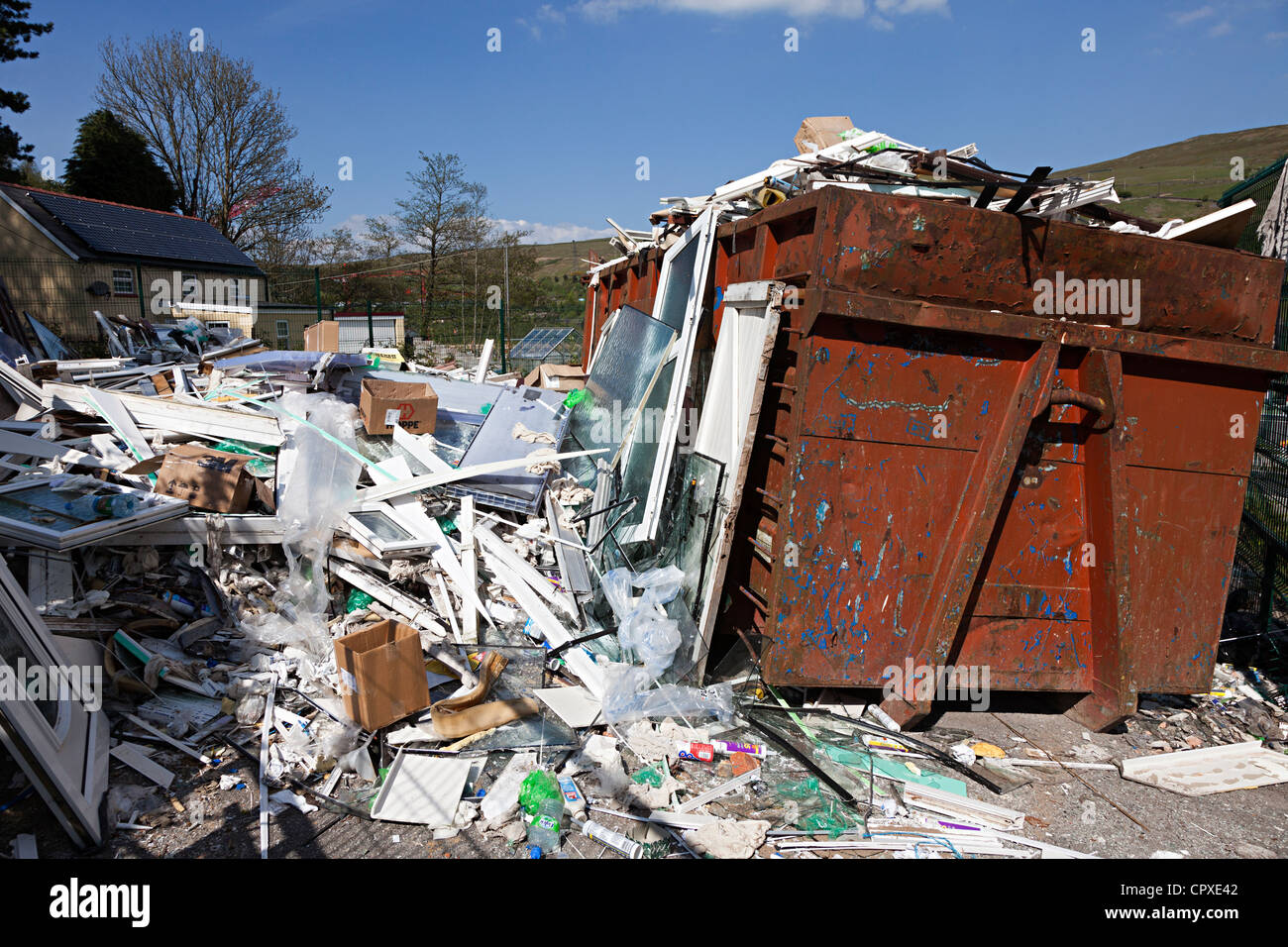 Skip and waste uPVC from double glazing manufacturing, Ebbw Vale, Wales