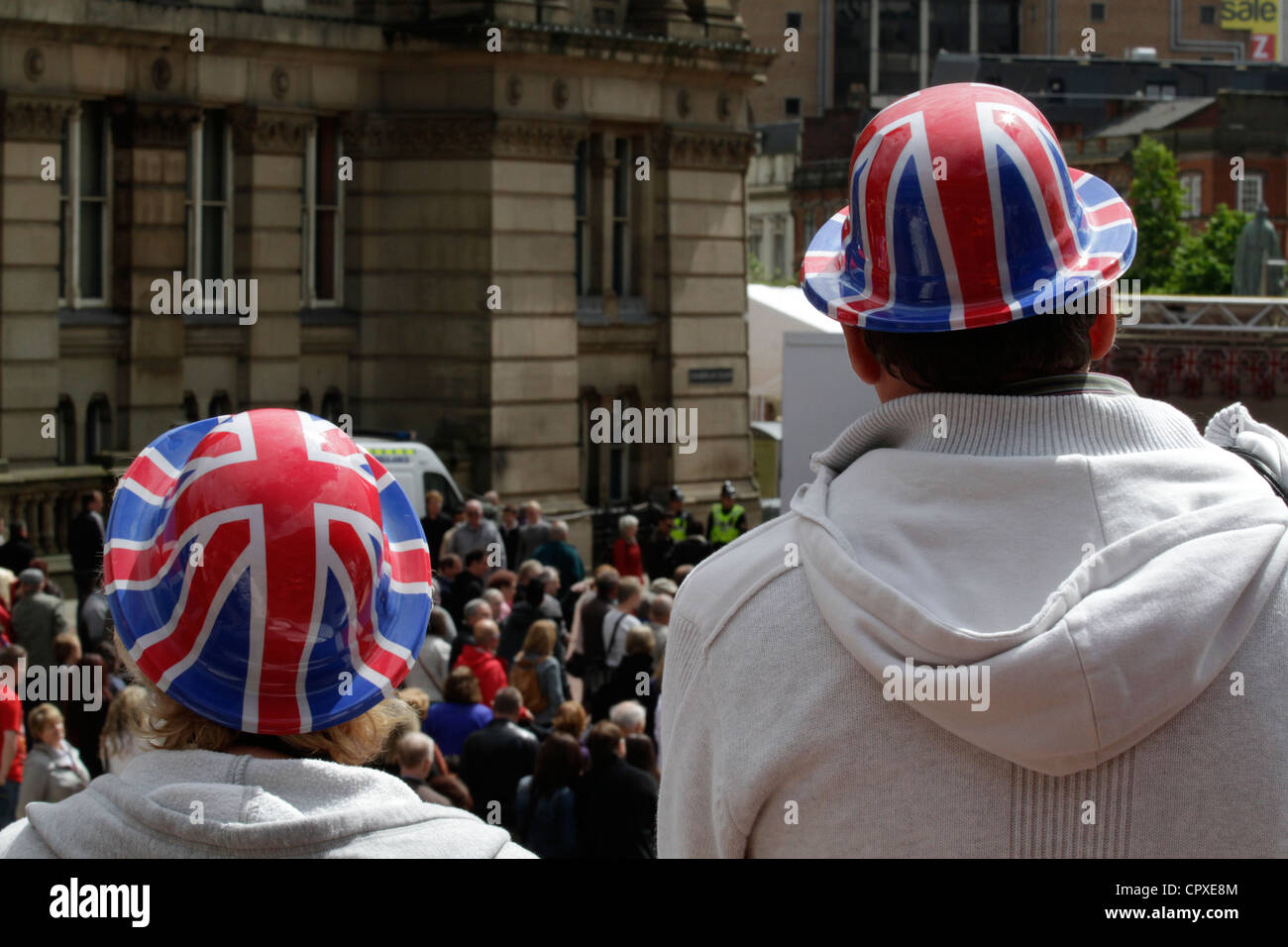 Couple wearing union jack hats at Queens diamond jubilee 2012 Stock