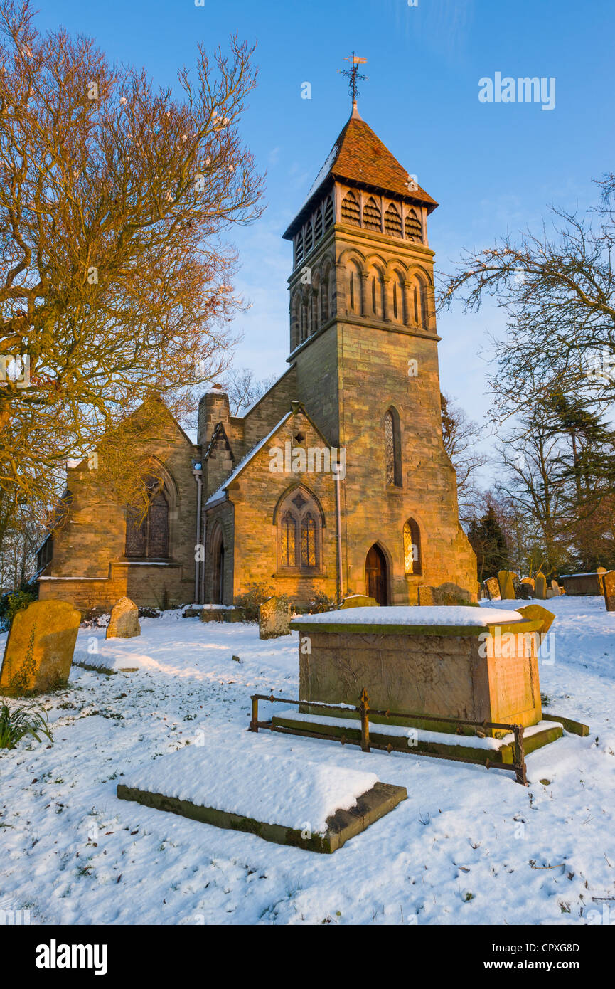 A snow covered winter sunset at the Old Milverton church, Old Milverton