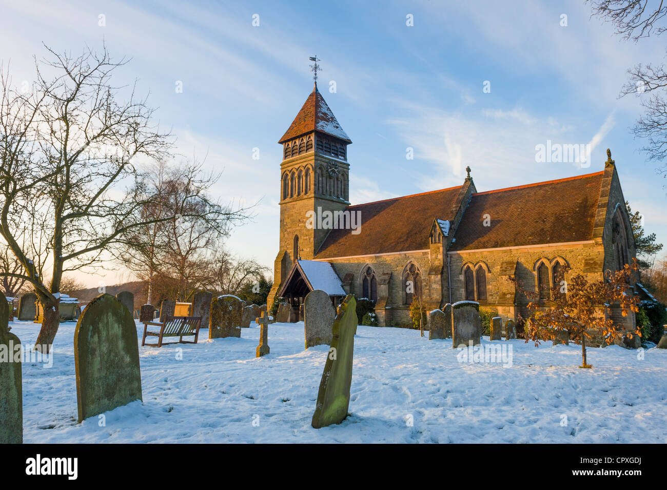 A snow covered winter sunset at the Old Milverton church, Old Milverton