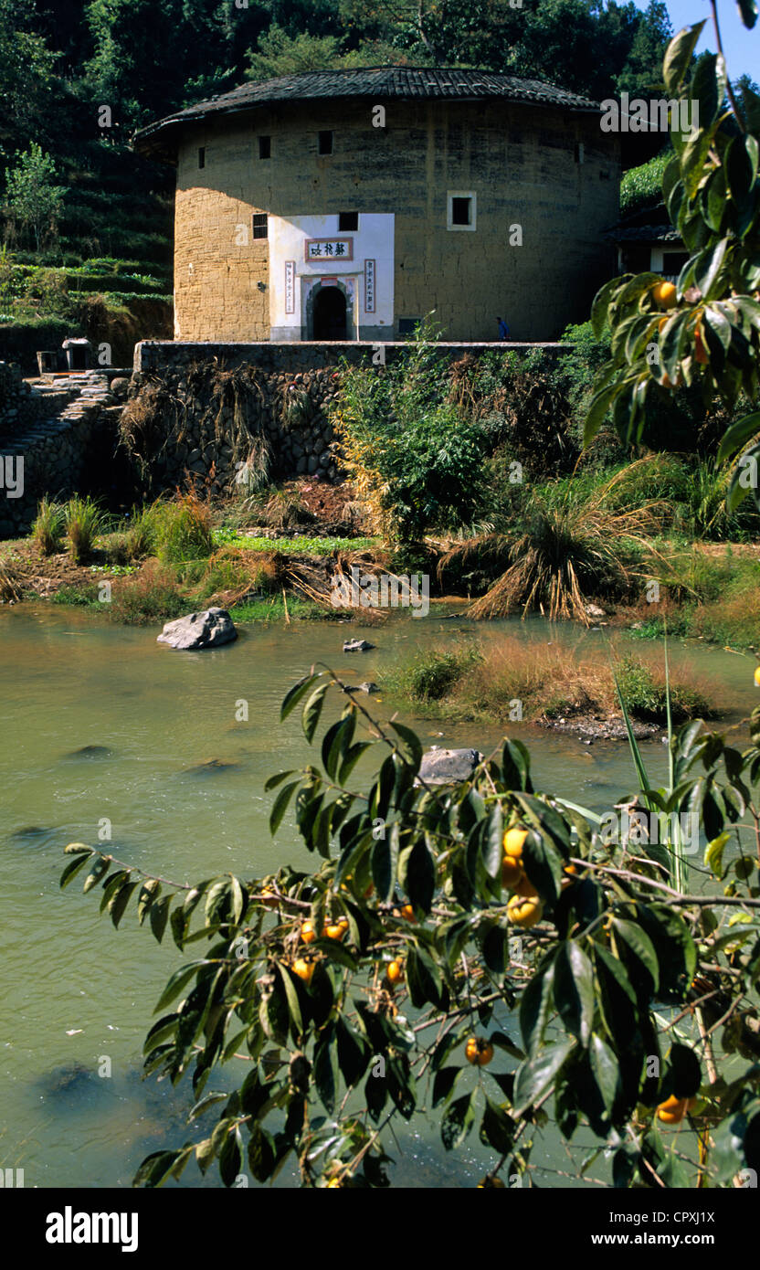 China Fujian Province Hukeng Tulou building communal living structure designed to be easily defensible made of brick stone or Stock Photo