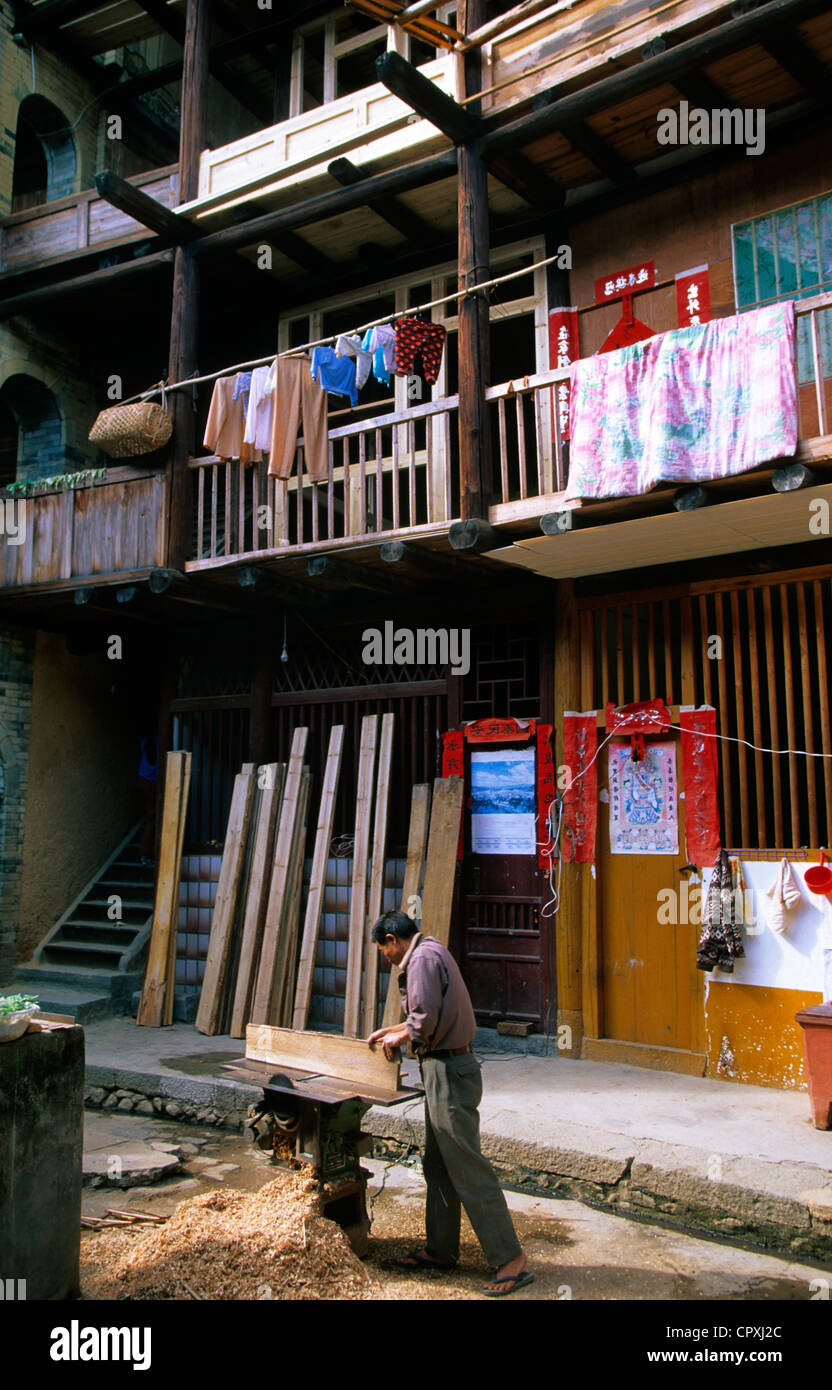 China Fujian Province Hukeng inside of Tulou building communal living structure designed to be easily defensible made of brick Stock Photo