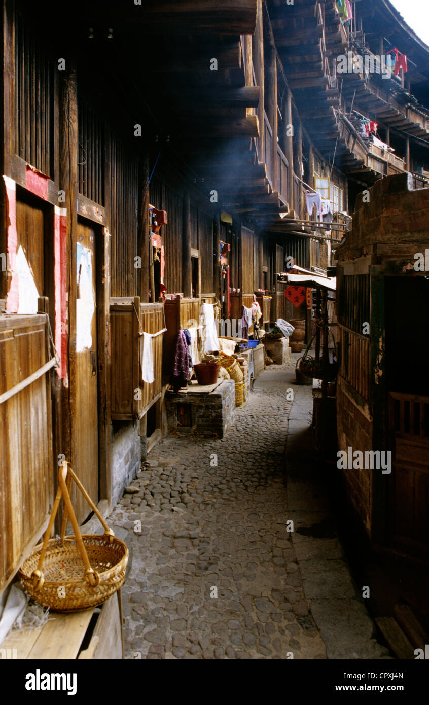China Fujian Province Hukeng inside of Tulou building communal living structure designed to be easily defensible made of brick Stock Photo