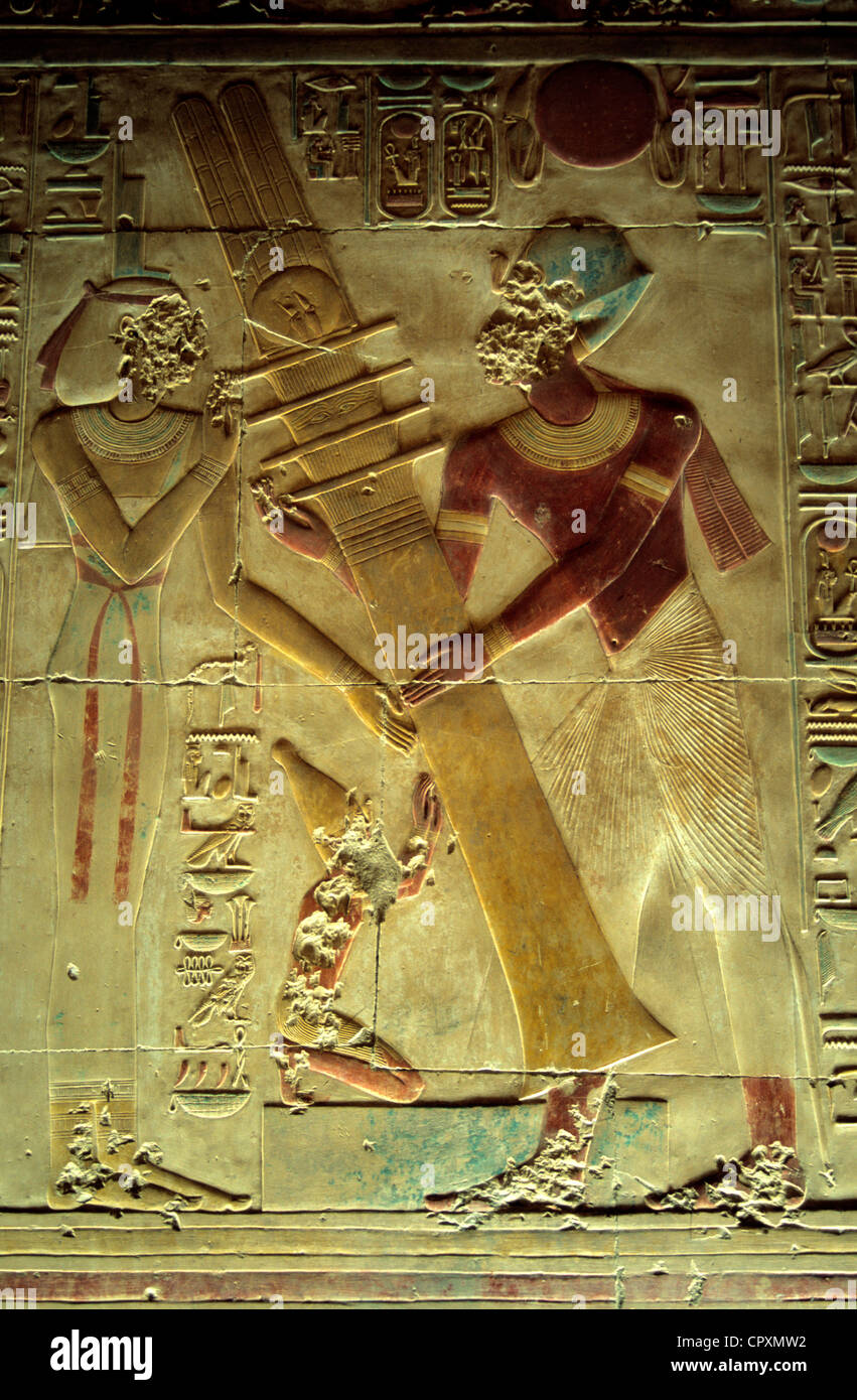 Egypt, Upper Egypt, Nile Valley, Nubia, Abydos Temple, pharaoh Seti I and Isis Goddess raising the Djed Pillar Stock Photo