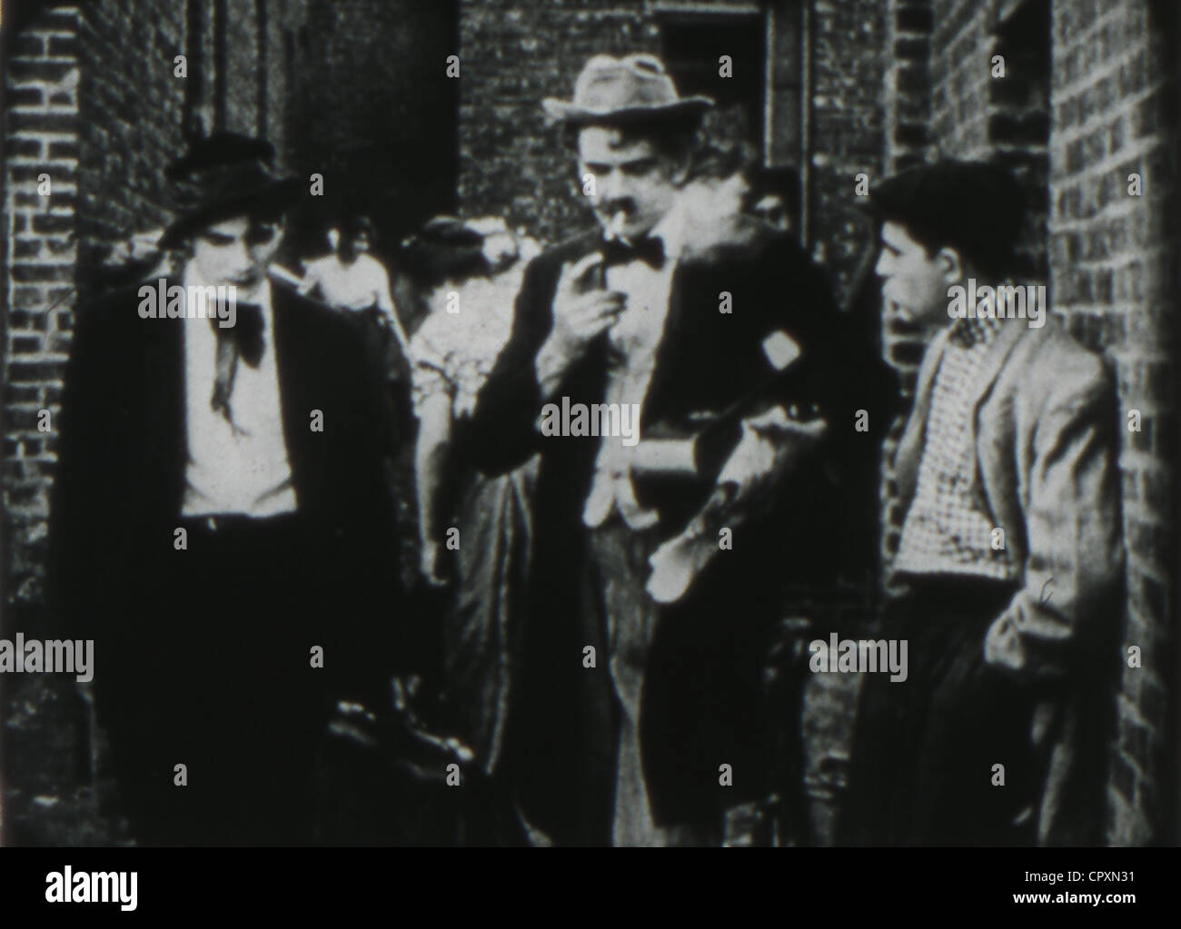 Still from D.W. Griffith's The Musketeers of Pig Alley (1912) released by Biograph. Stock Photo